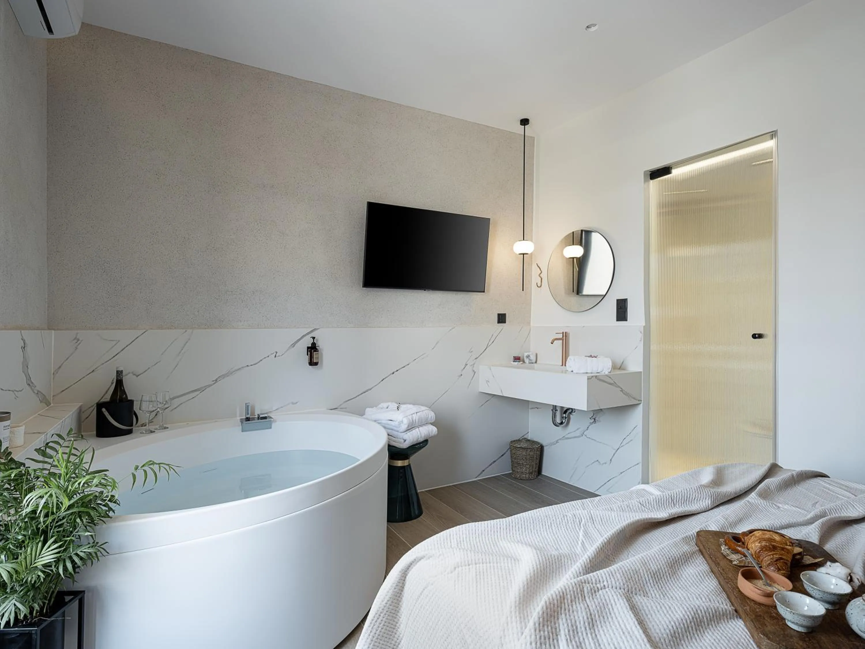 Bed in Amphitrite Hotel