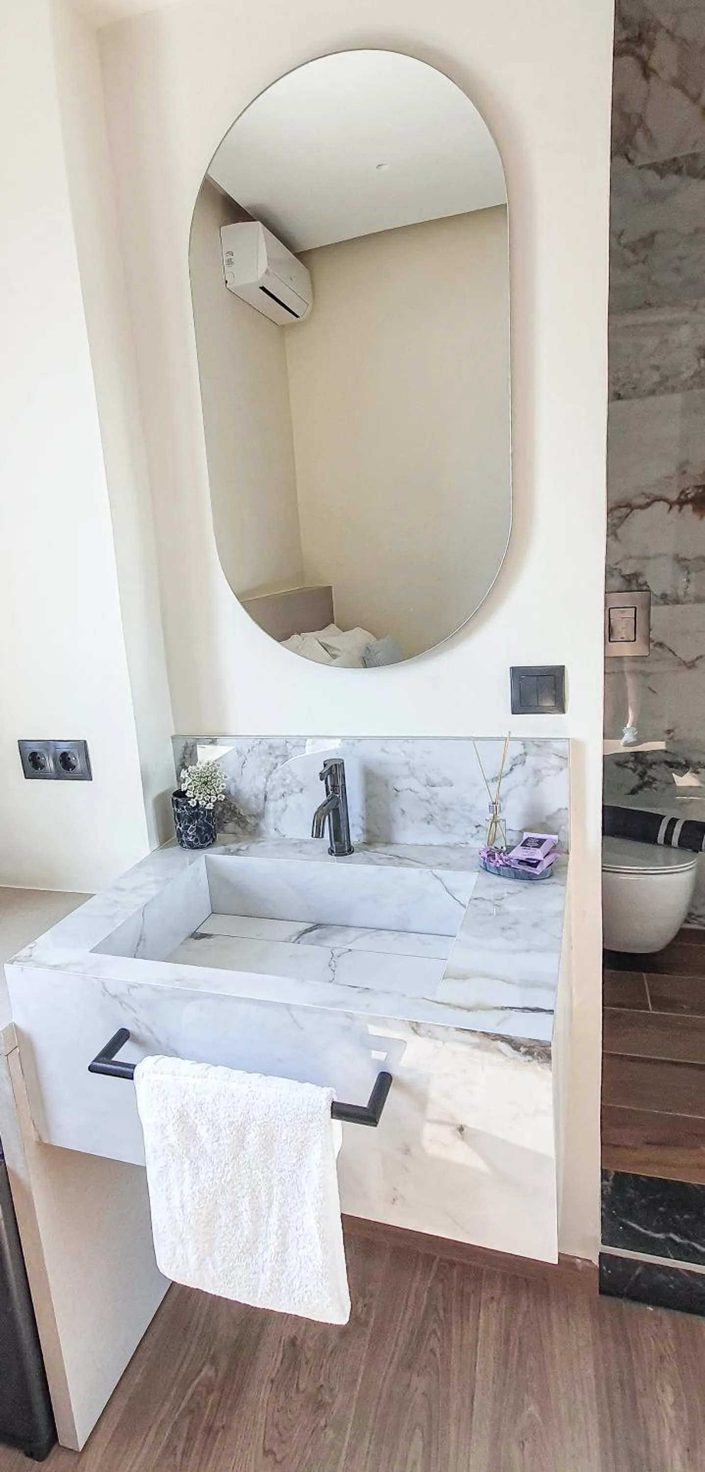 Bed in Amphitrite Hotel