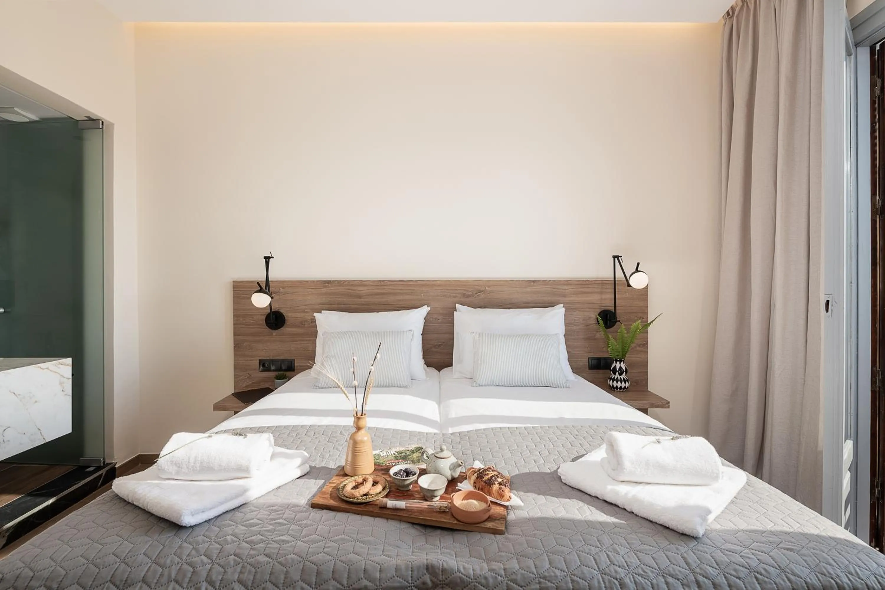 Bed in Amphitrite Hotel