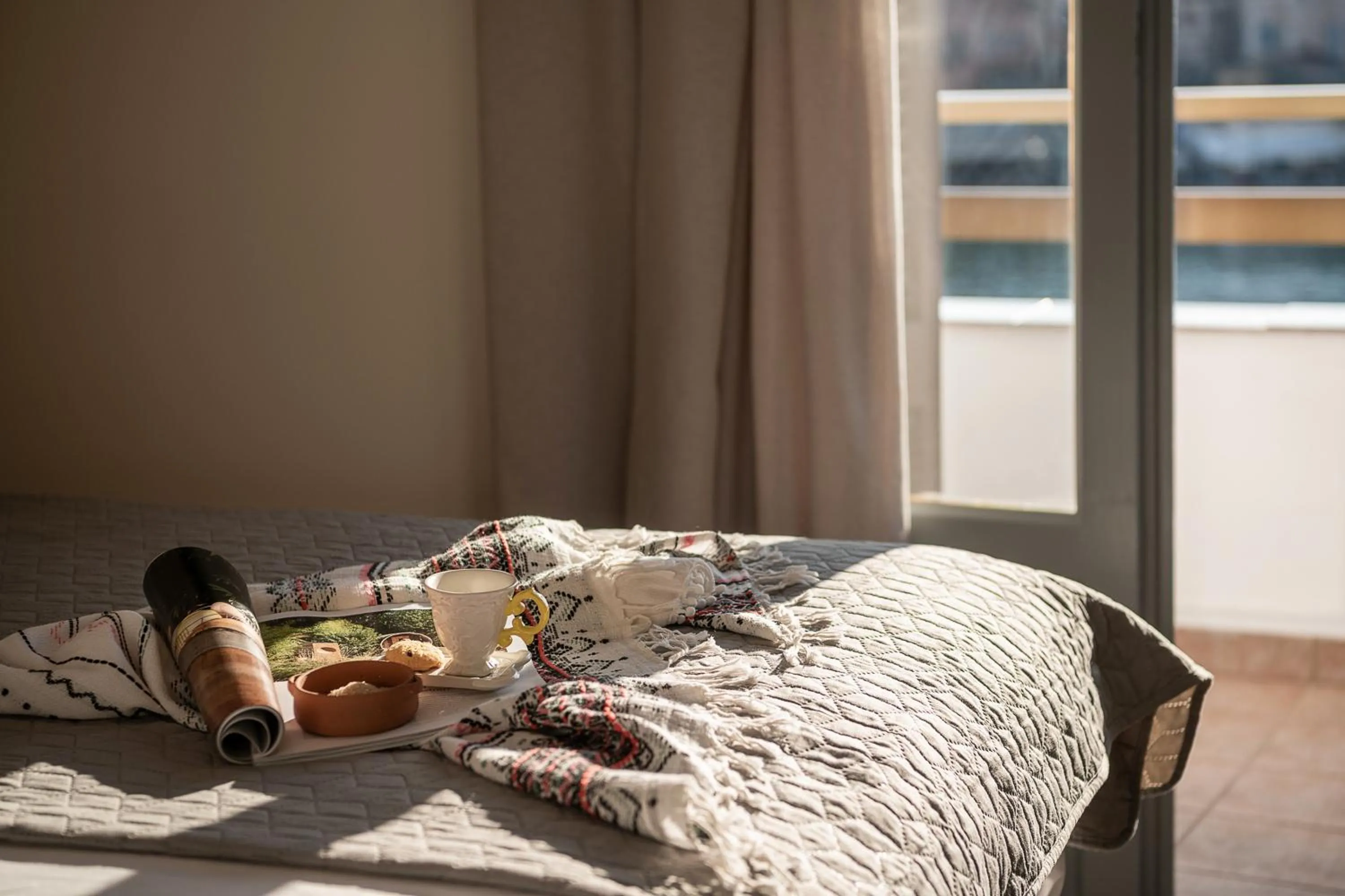 Bed in Amphitrite Hotel