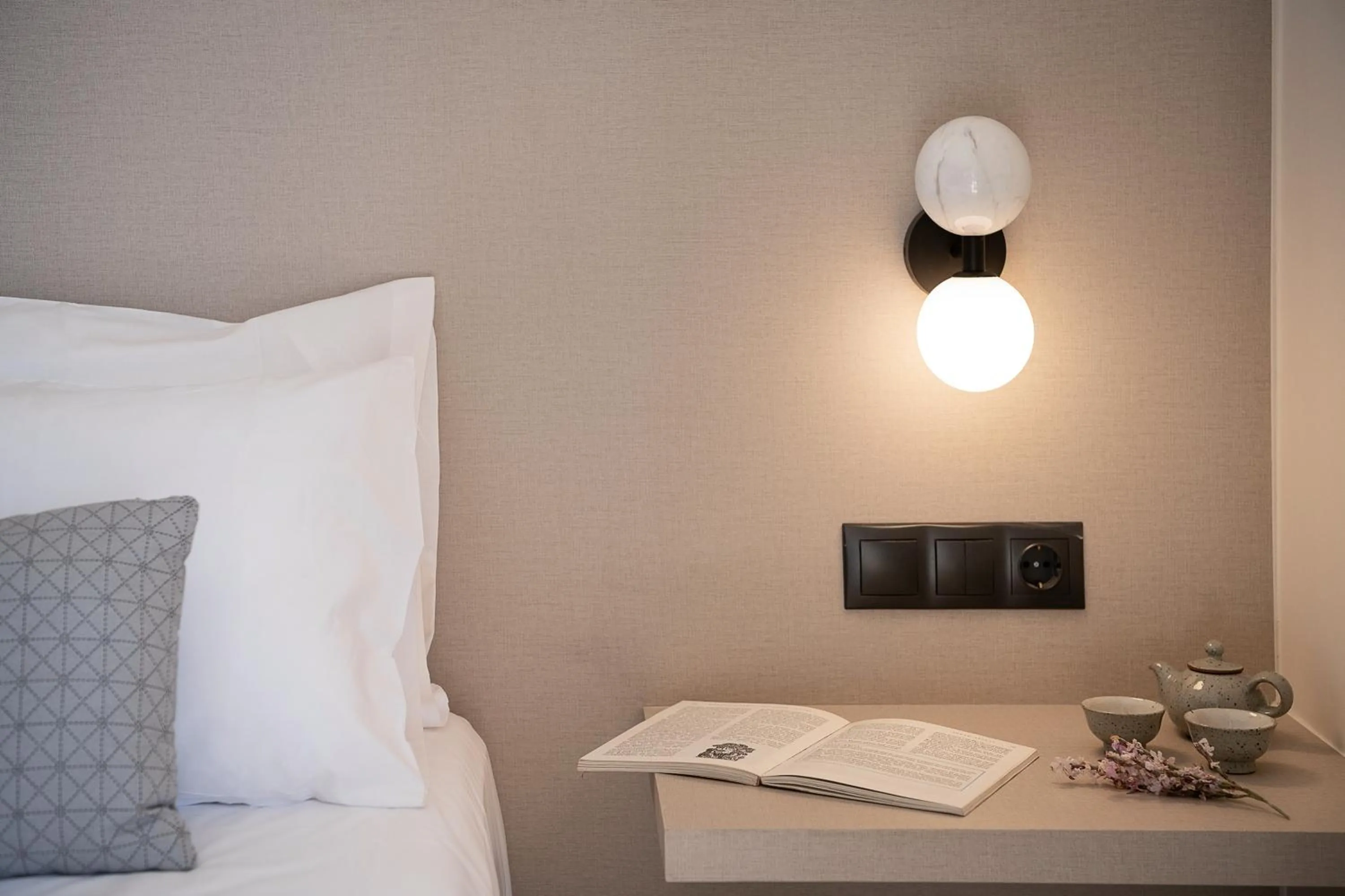 Bed in Amphitrite Hotel