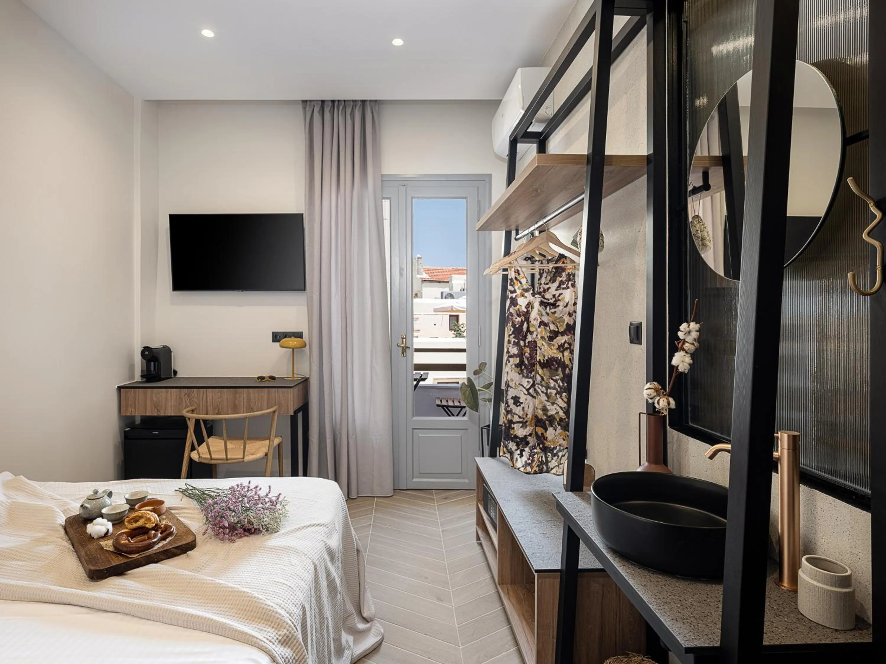 Bed in Amphitrite Hotel