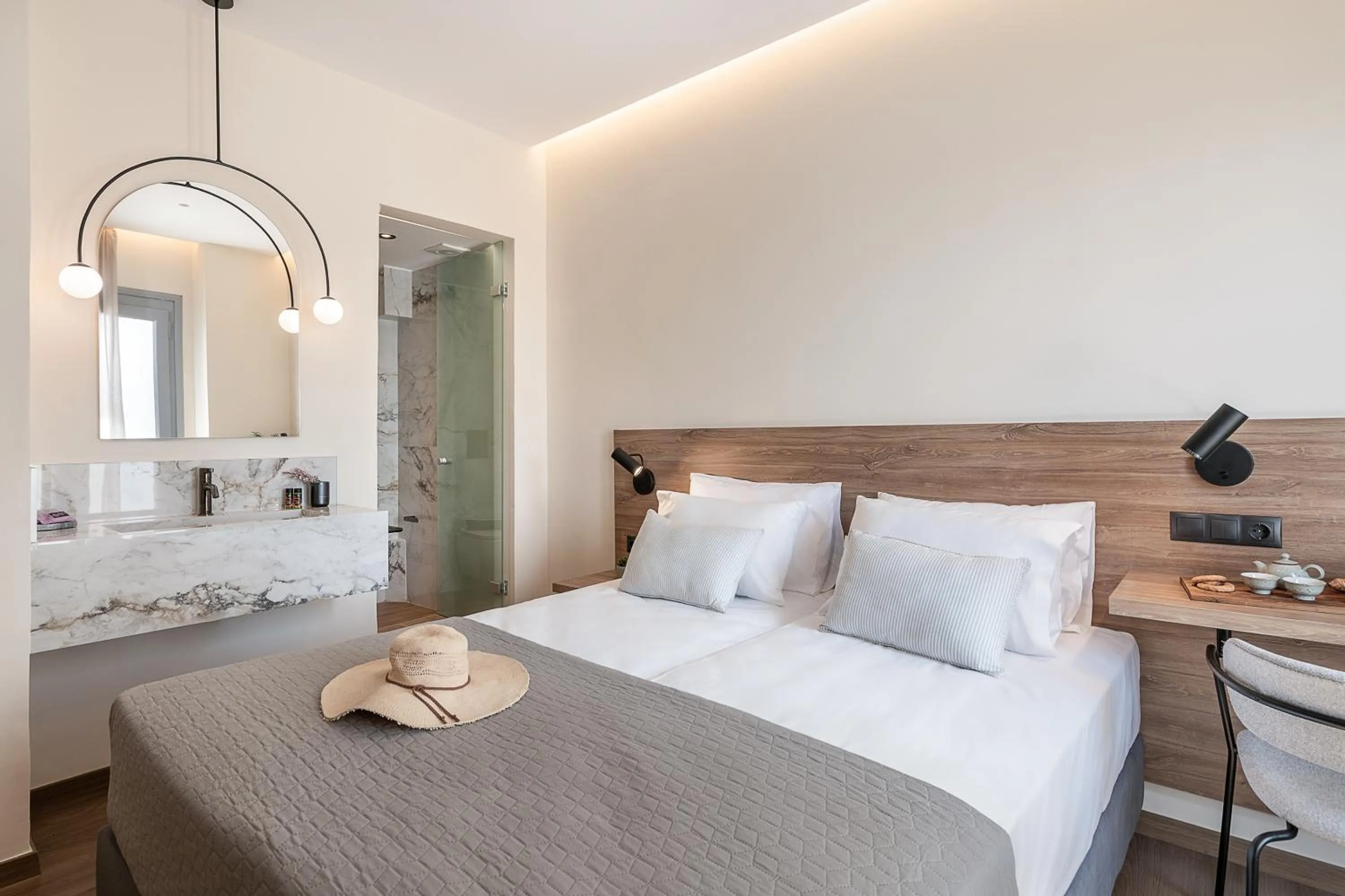 Bed in Amphitrite Hotel