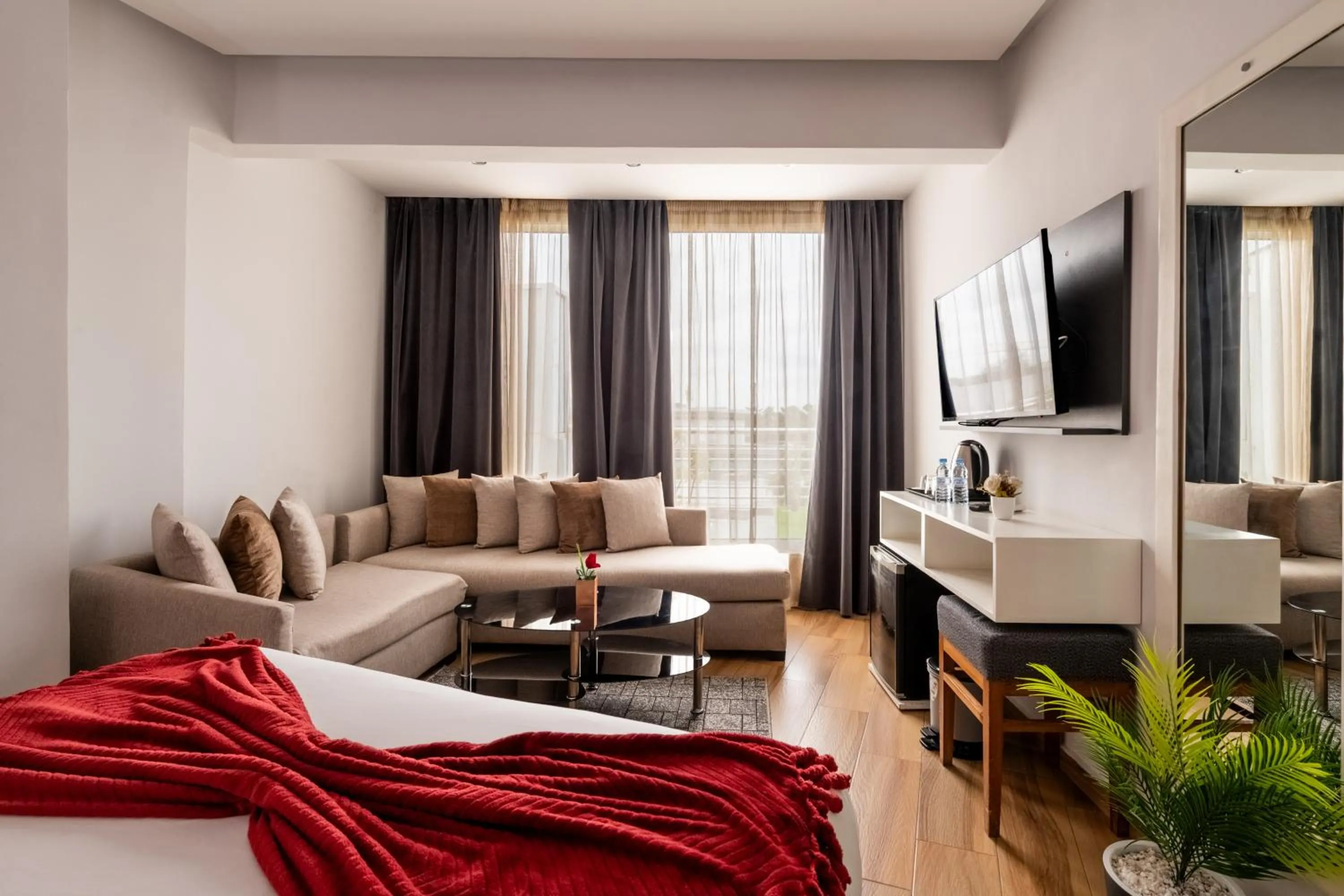 Communal lounge/ TV room, Bed in Hotel Le Musée