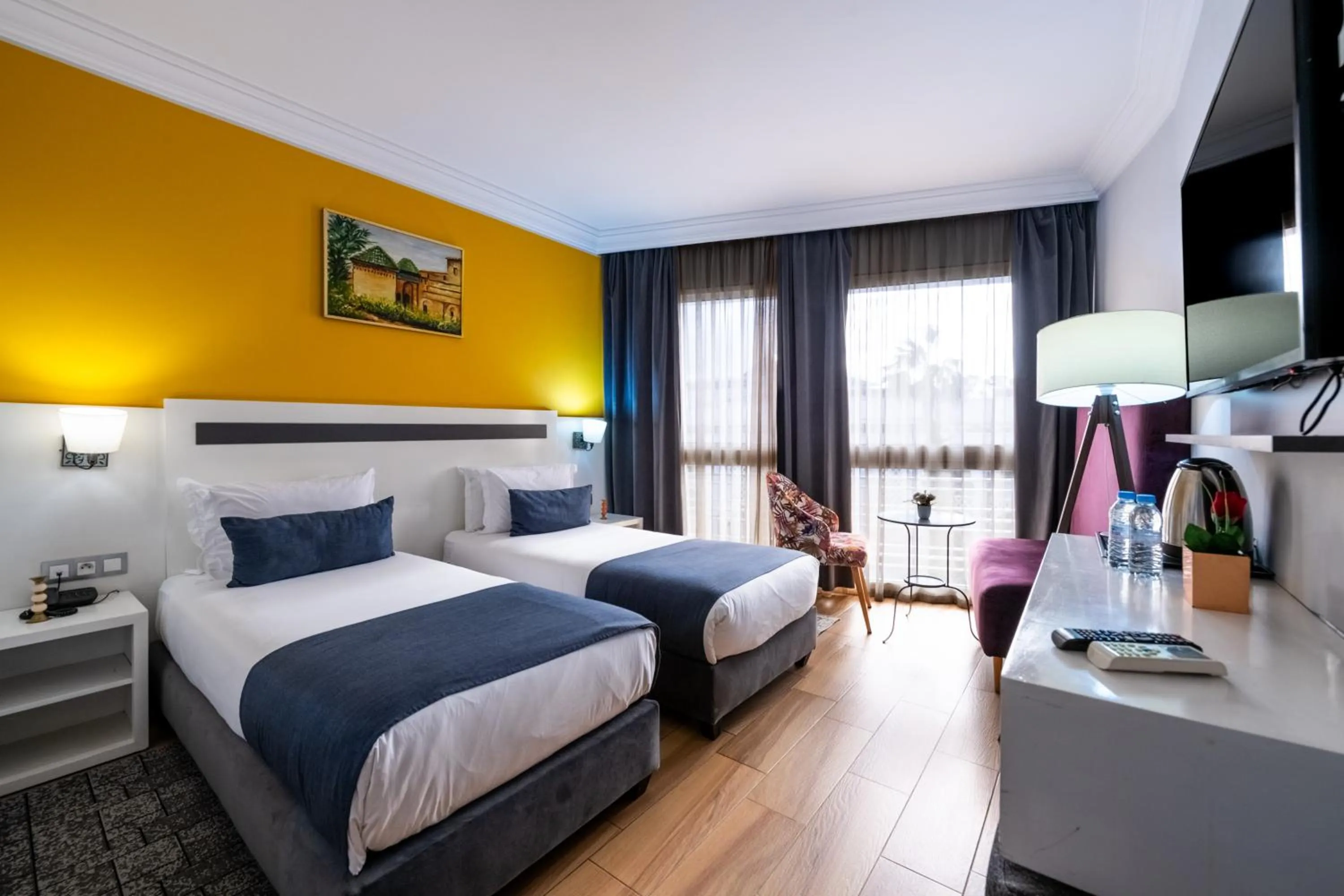 Communal lounge/ TV room, Bed in Hotel Le Musée