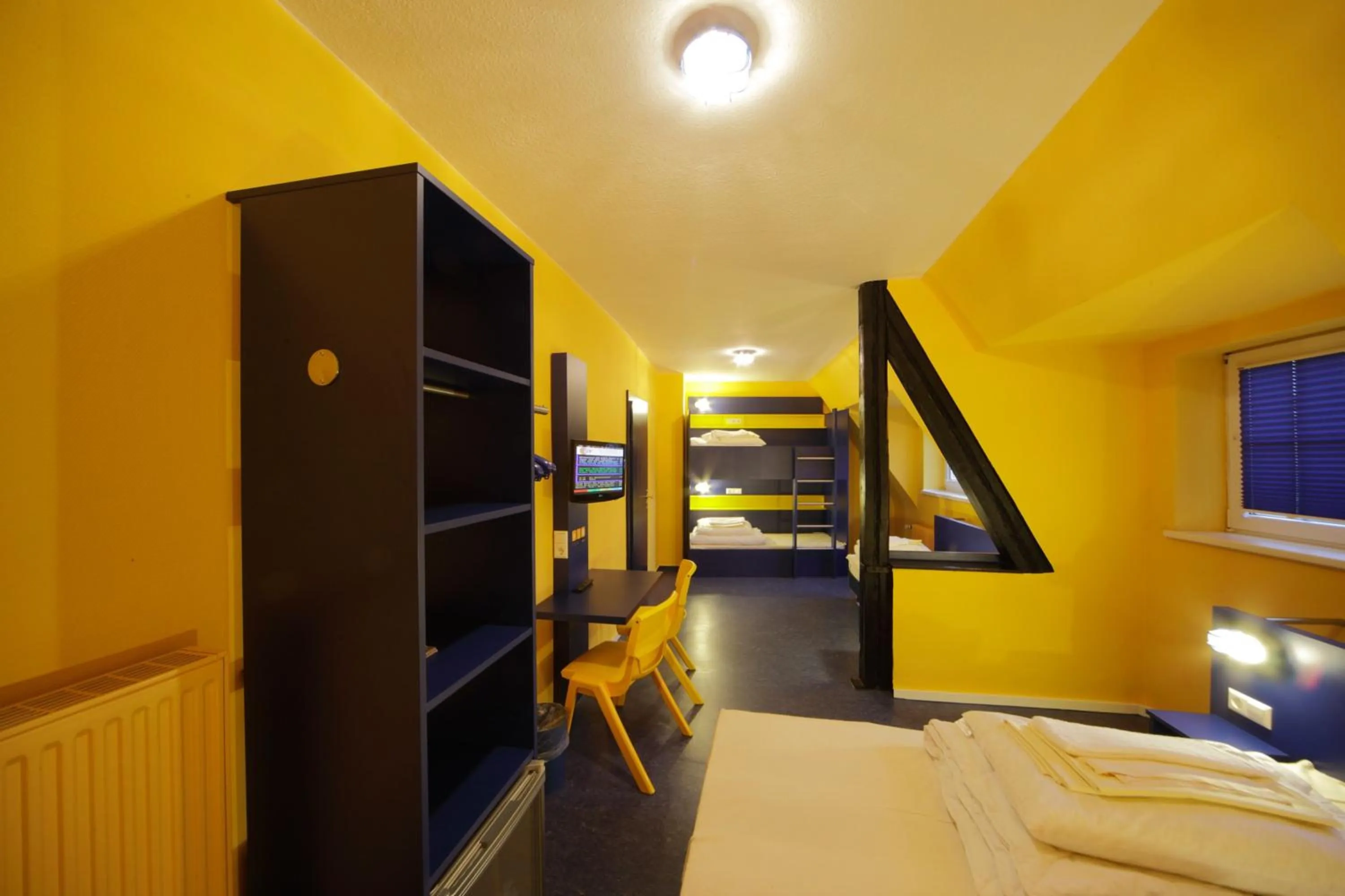 Photo of the whole room, Bed in Bed'nBudget Expo-Hostel Rooms