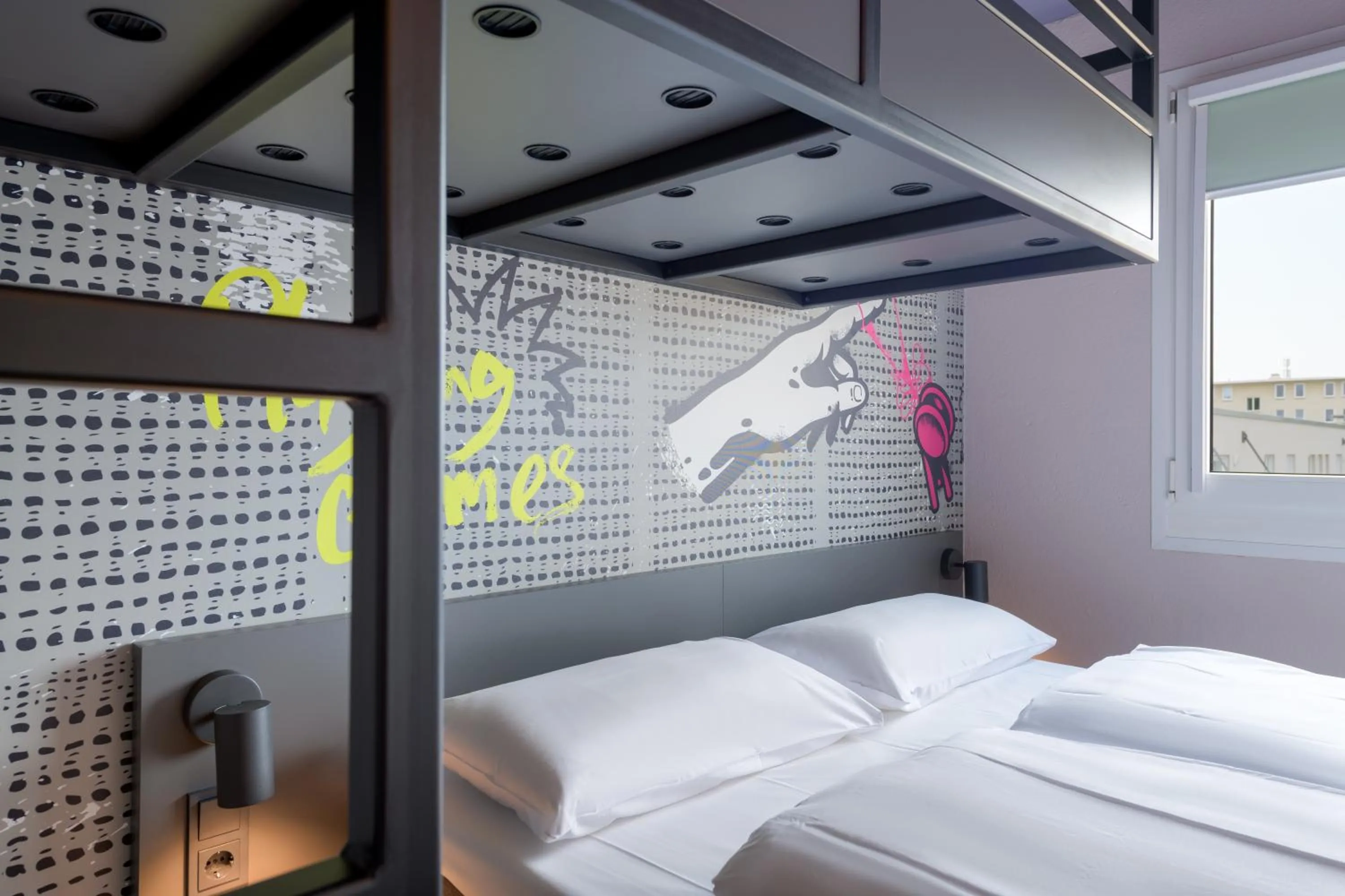 Bed in Felix Hotel Darmstadt