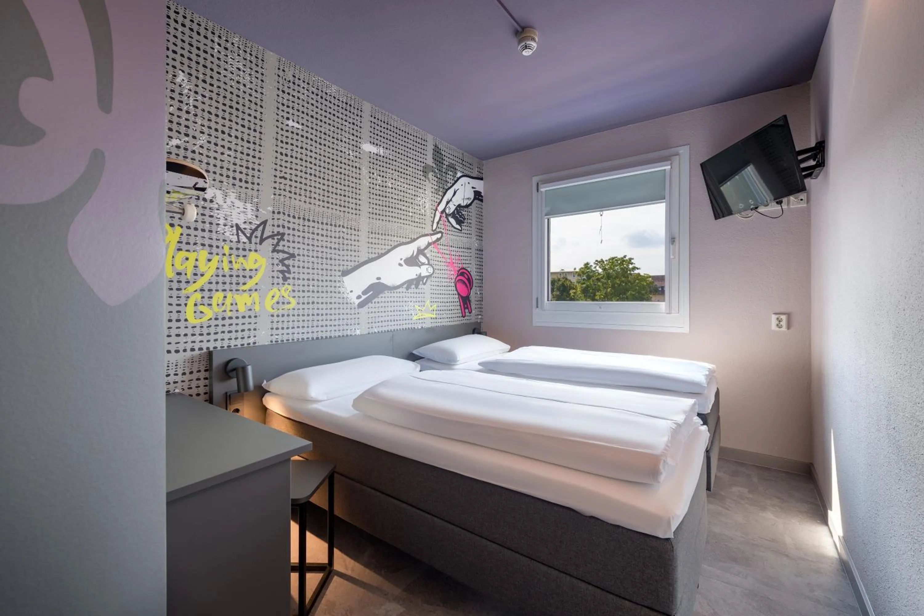 Bed in Felix Hotel Darmstadt