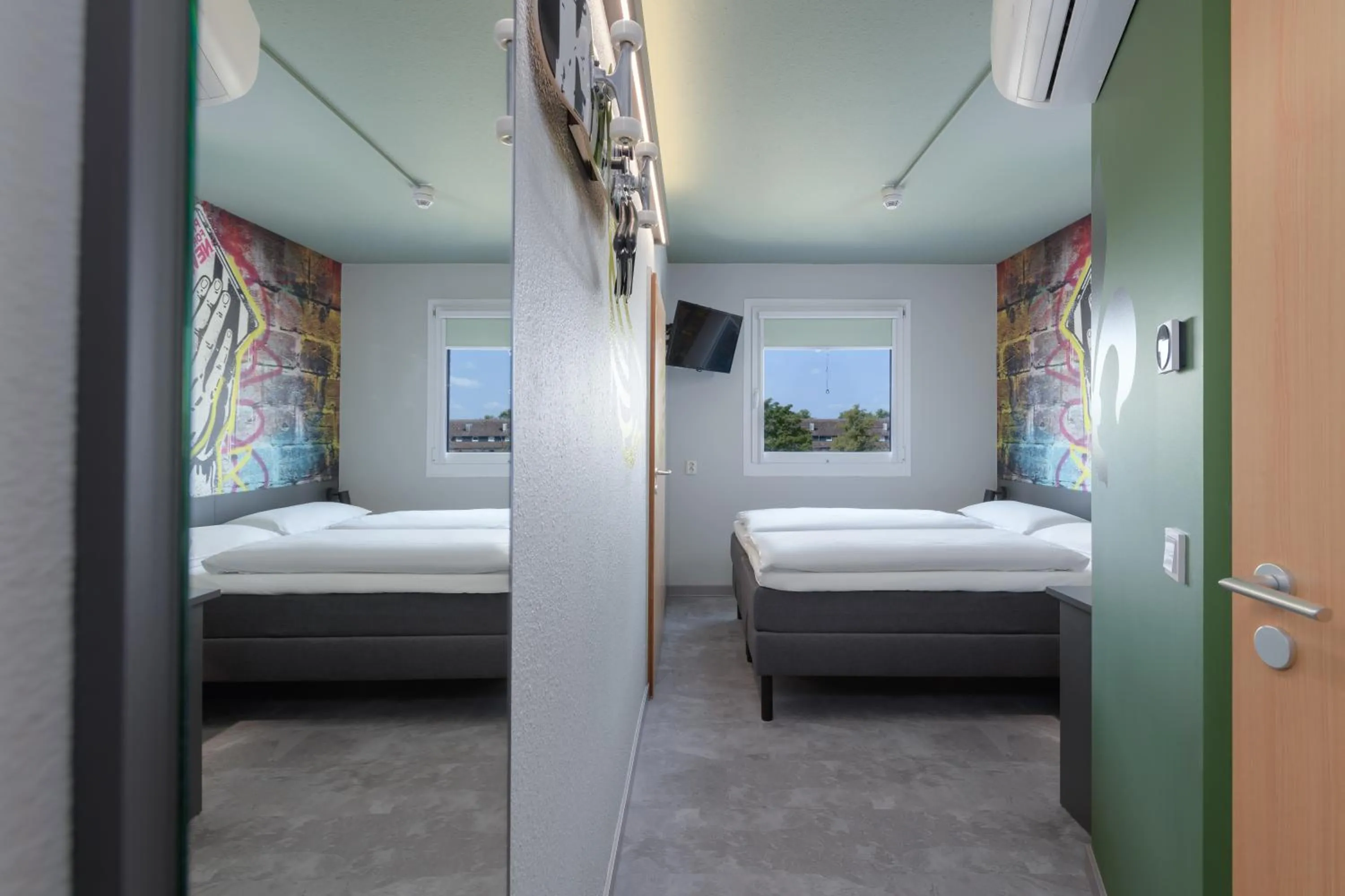 Photo of the whole room, Bed in Felix Hotel Darmstadt