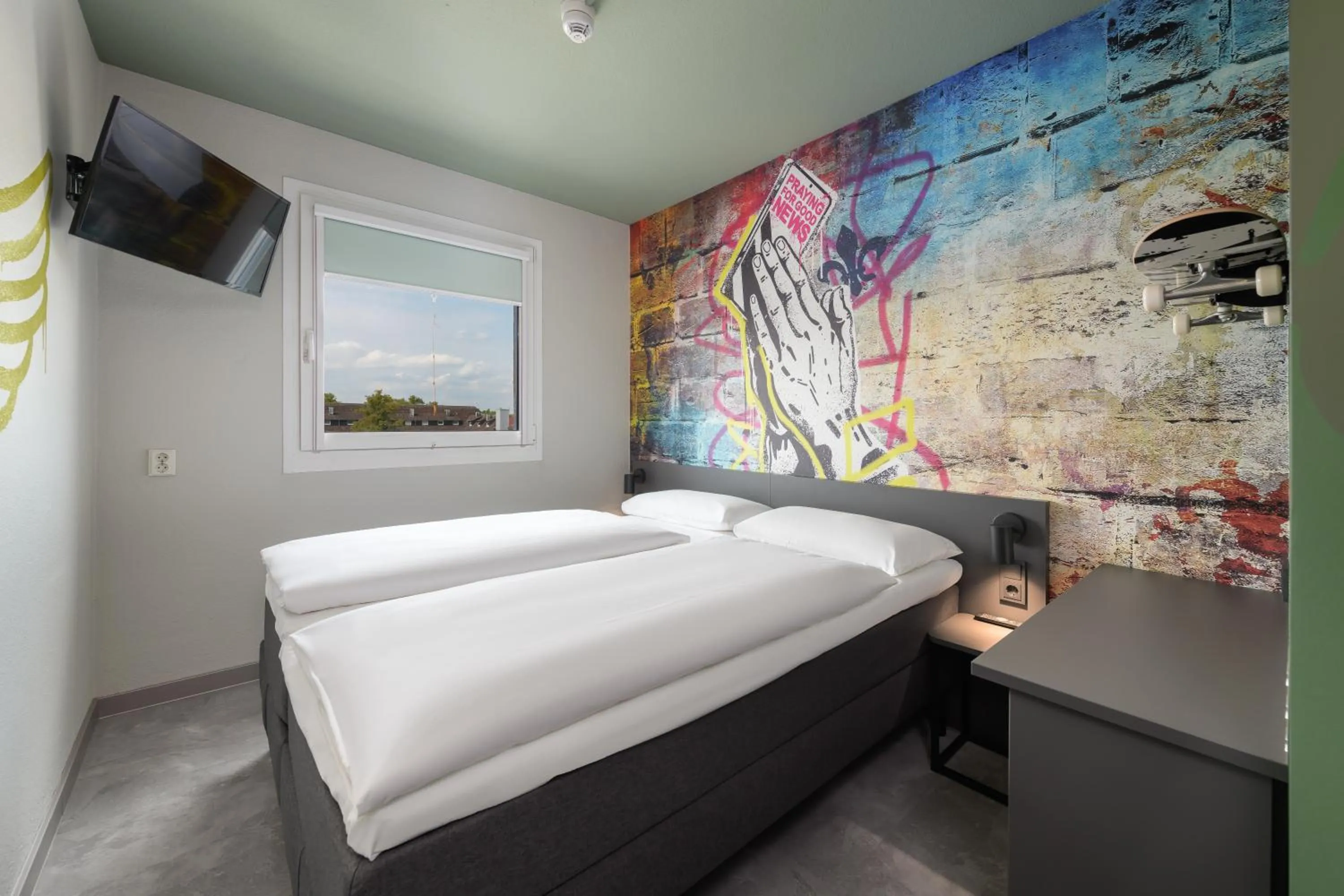 Bed in Felix Hotel Darmstadt