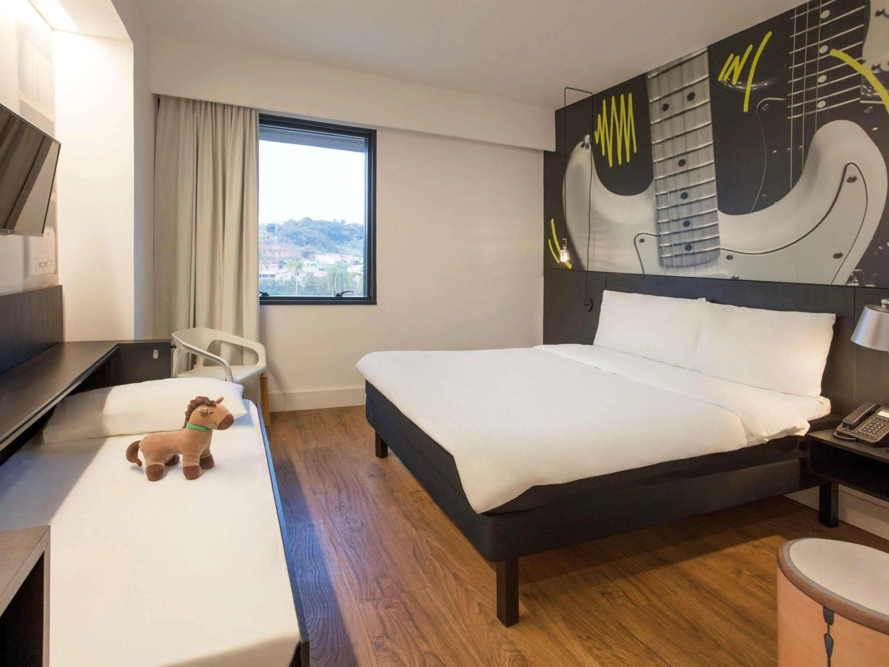 Bedroom, Bed in ibis Styles Taubate