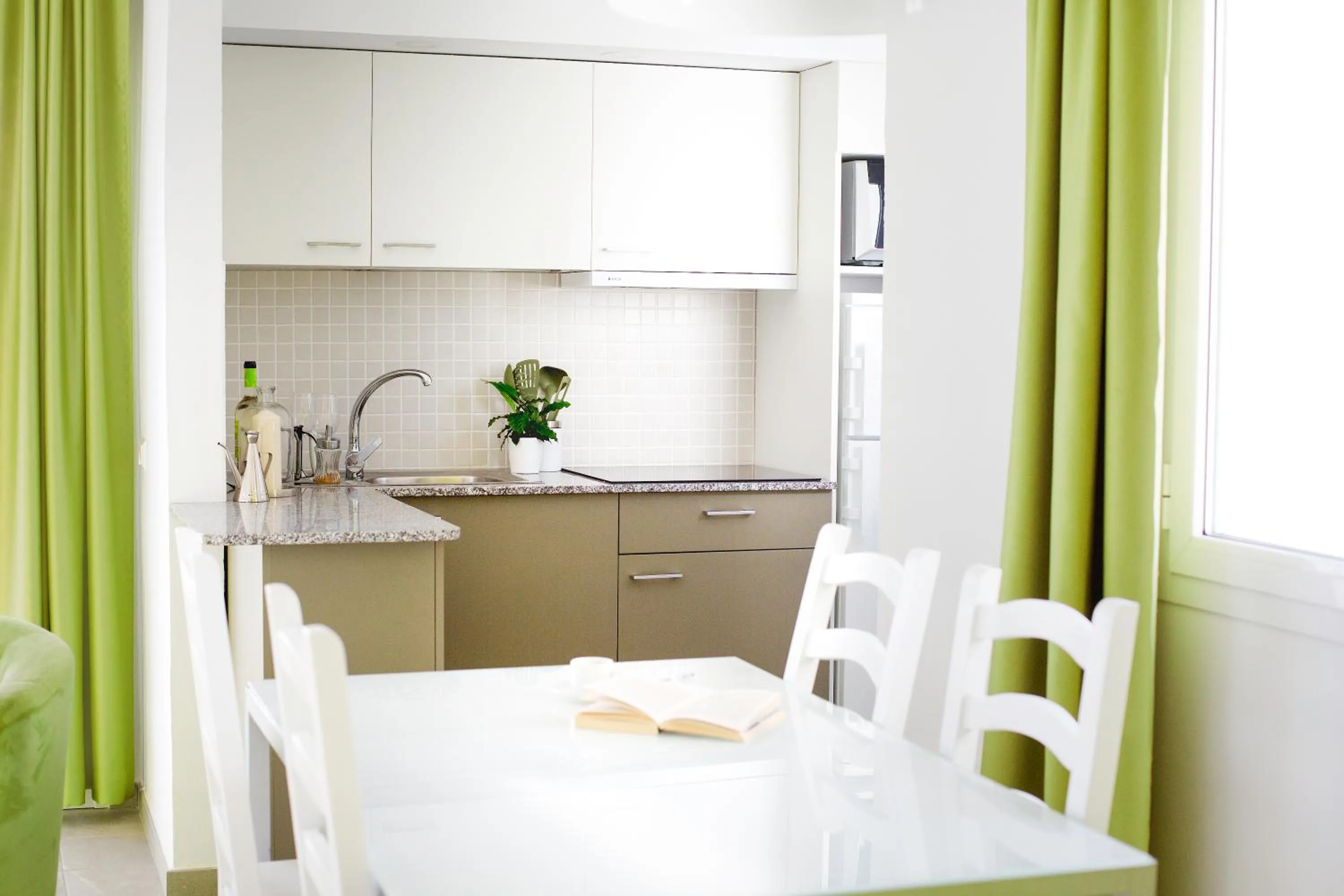 Kitchen or kitchenette in Apartamentos El Guarapo