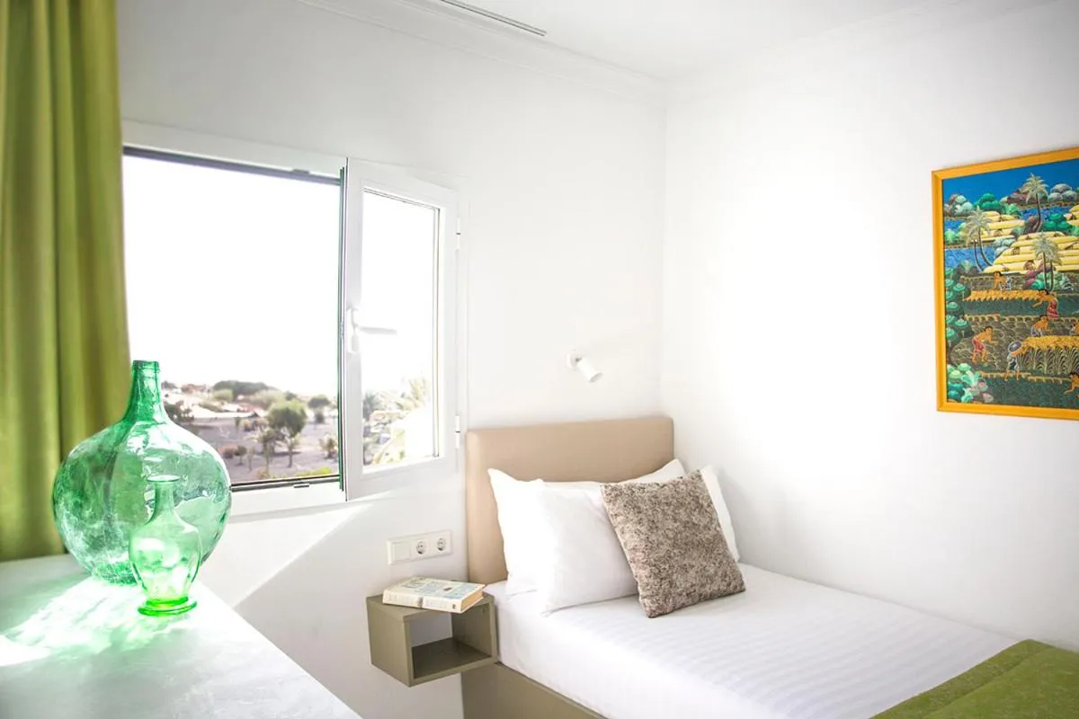 Bed in Apartamentos El Guarapo