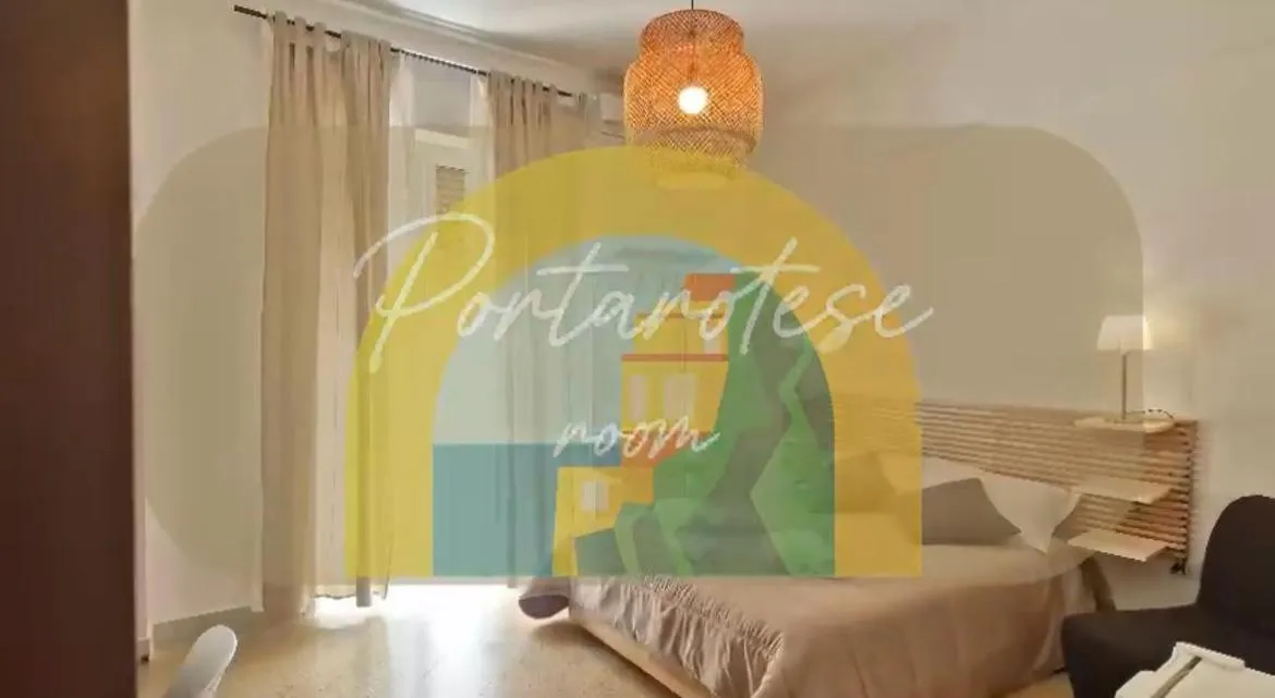 Triple Room with Balcony in Rooms hub Portarotese