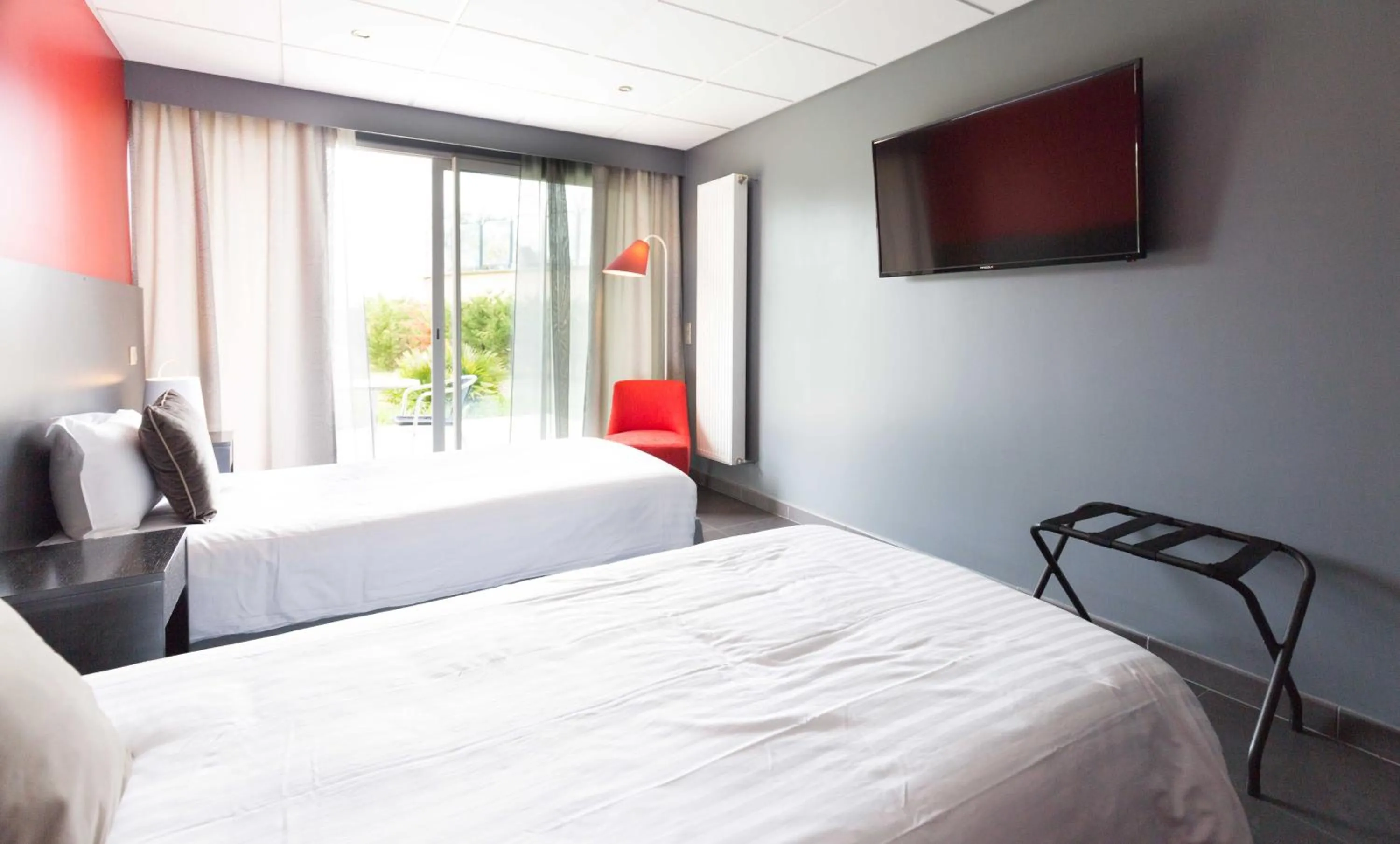 Photo of the whole room, Bed in Hôtel du Casino de Capvern