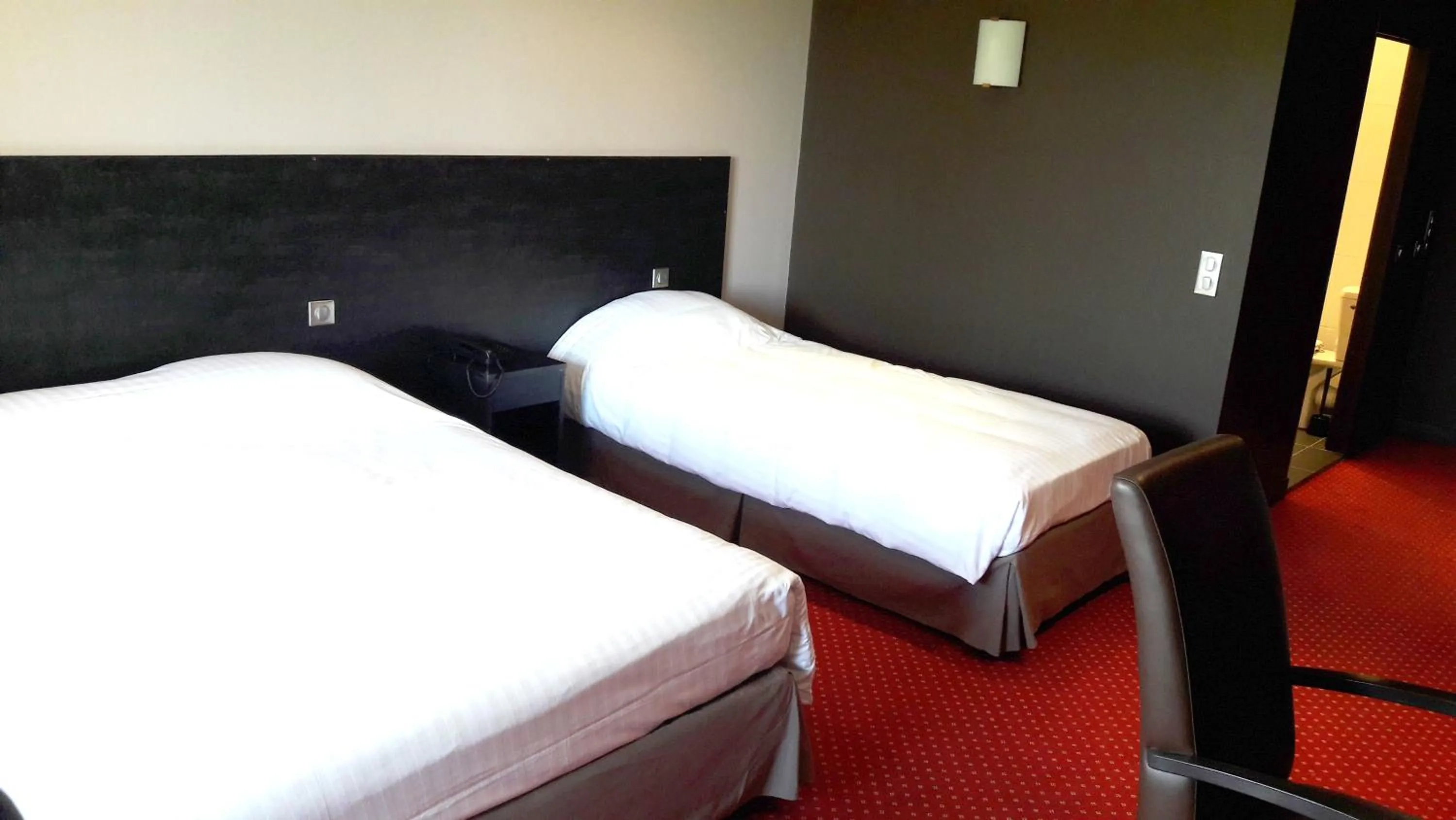 Bed in Hôtel du Casino de Capvern