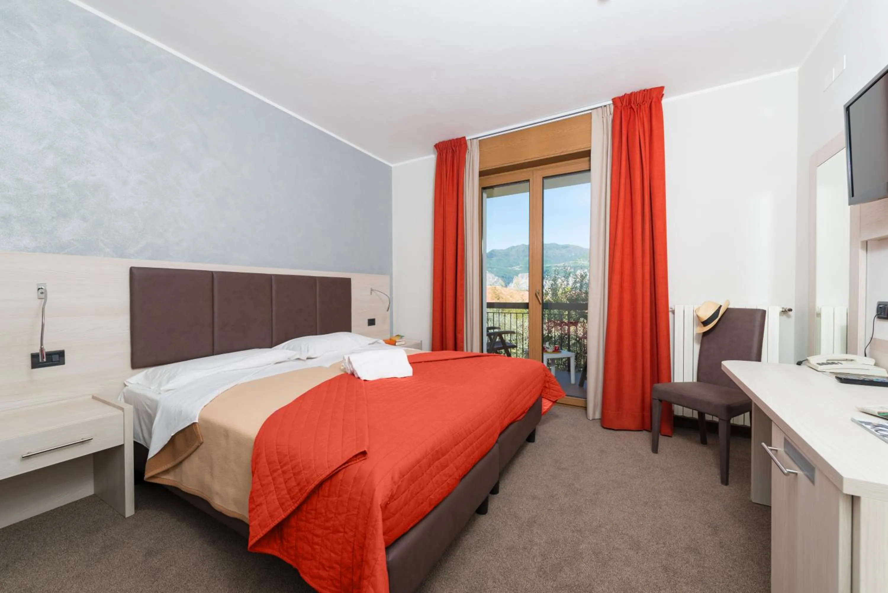 Bed in Hotel Catullo