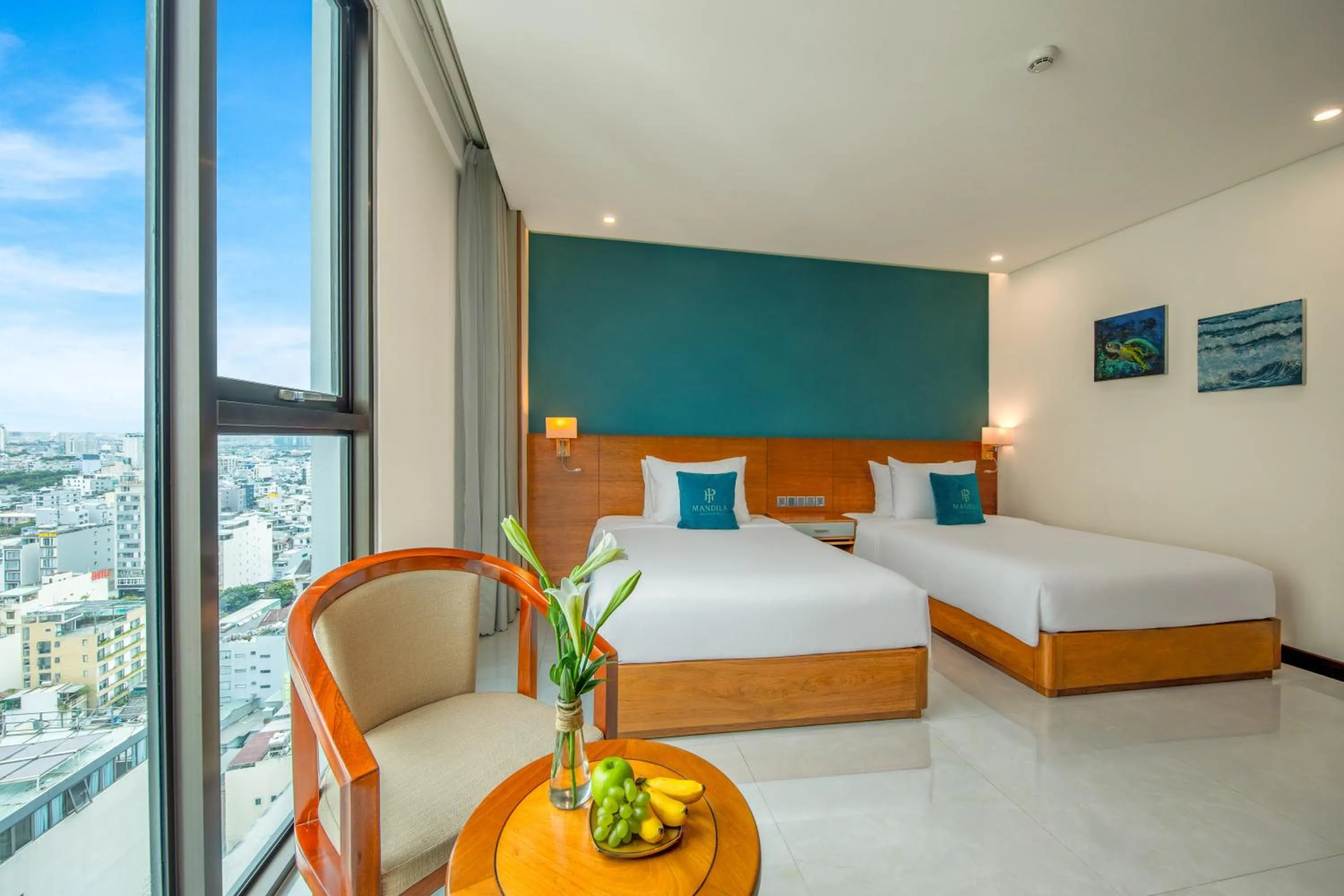 Seating area, Bed in Mandila Beach Hotel Danang