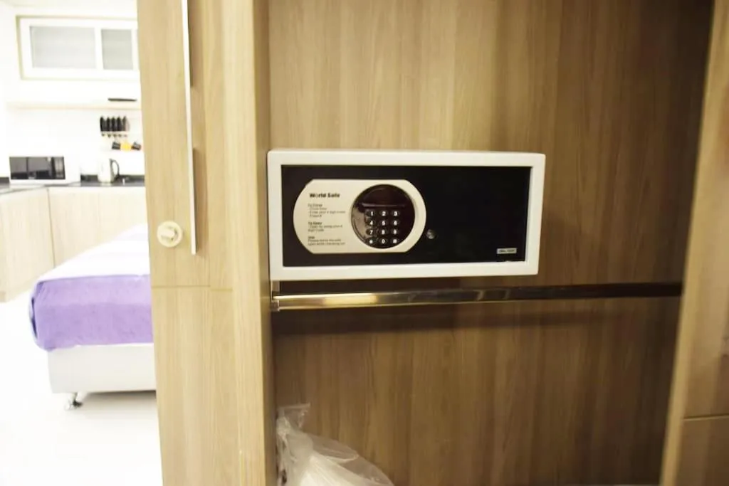 Property building, Bed in Family Suite Room Pratunam