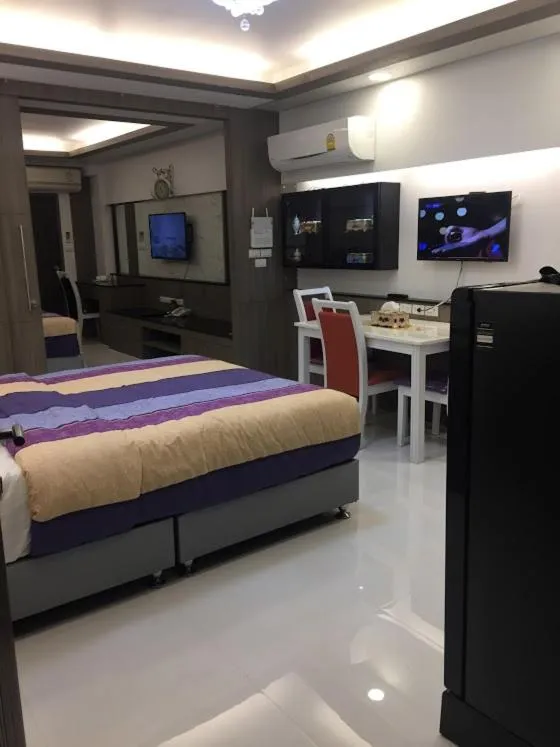 Bed in Family Suite Room Pratunam