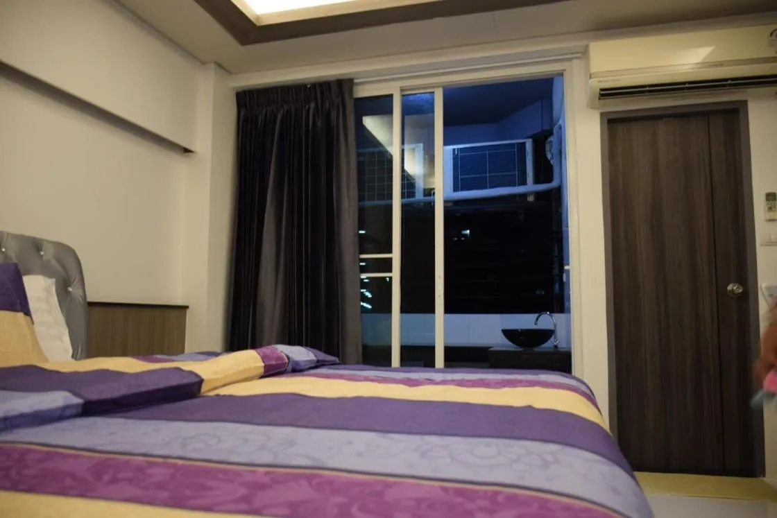 Bed in Family Suite Room Pratunam