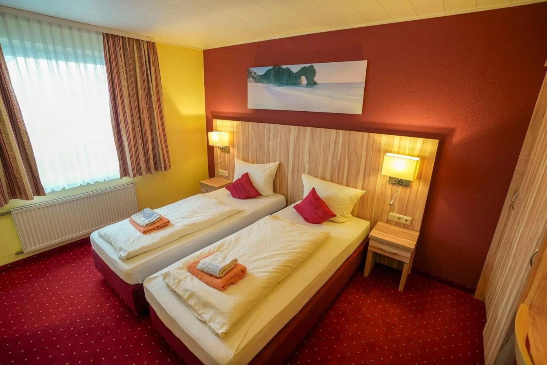 Bed in Hotel Weinhaus Kreuter