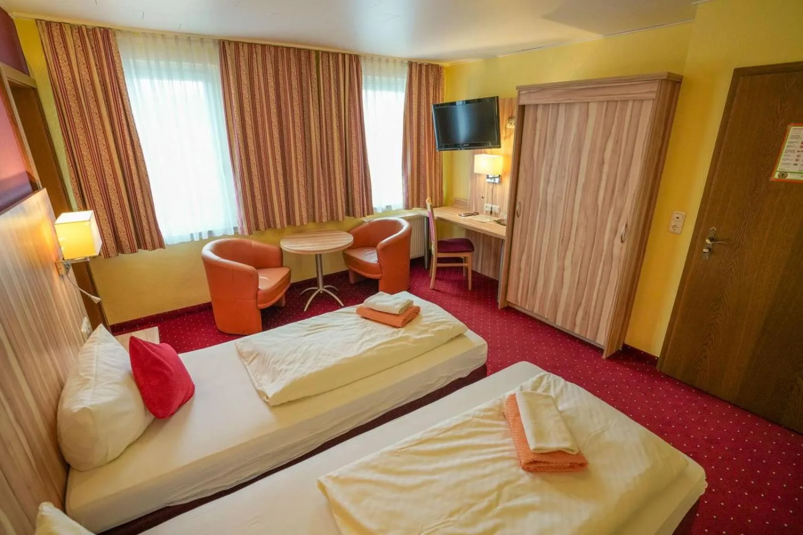 Bed in Hotel Weinhaus Kreuter