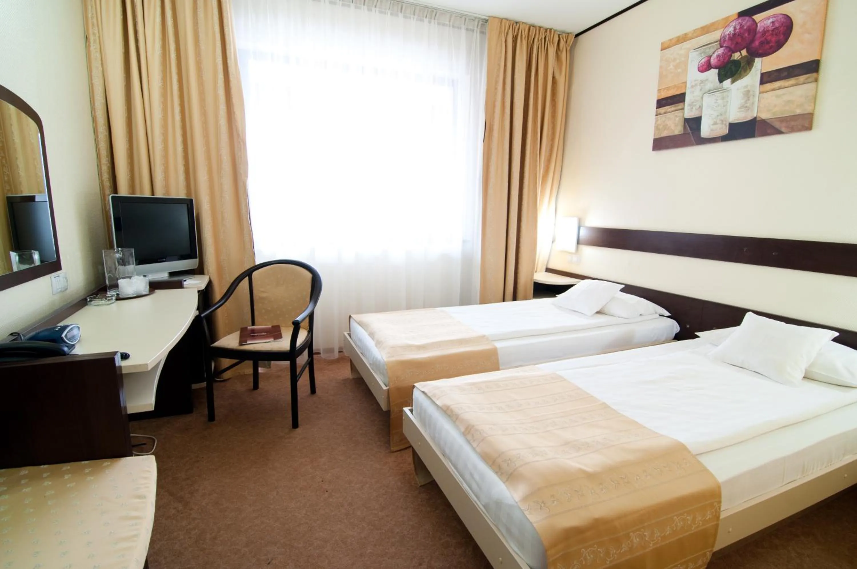 Photo of the whole room, Bed in Hotel Rapsodia City Center