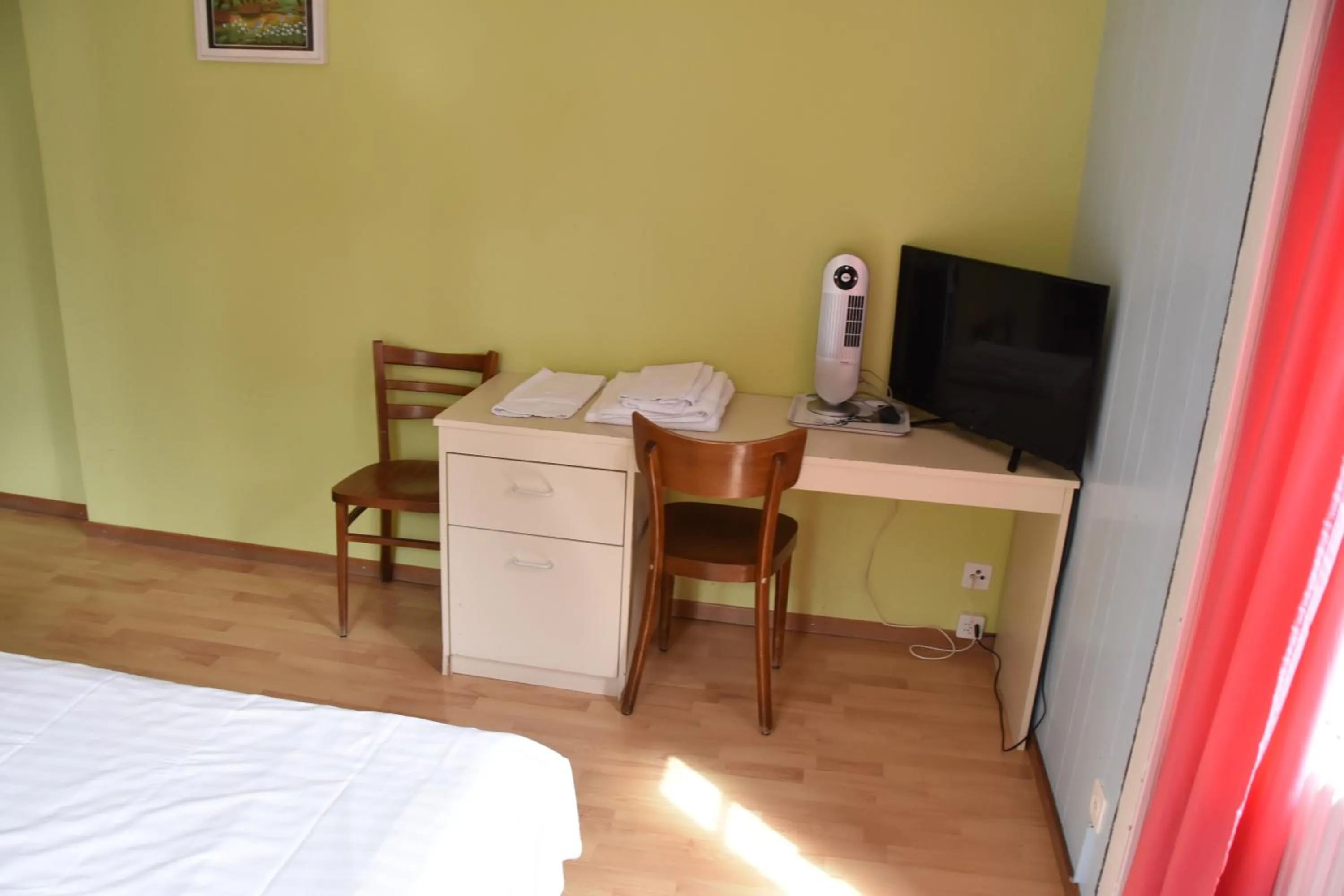 Bed in Hôtel de l'ours