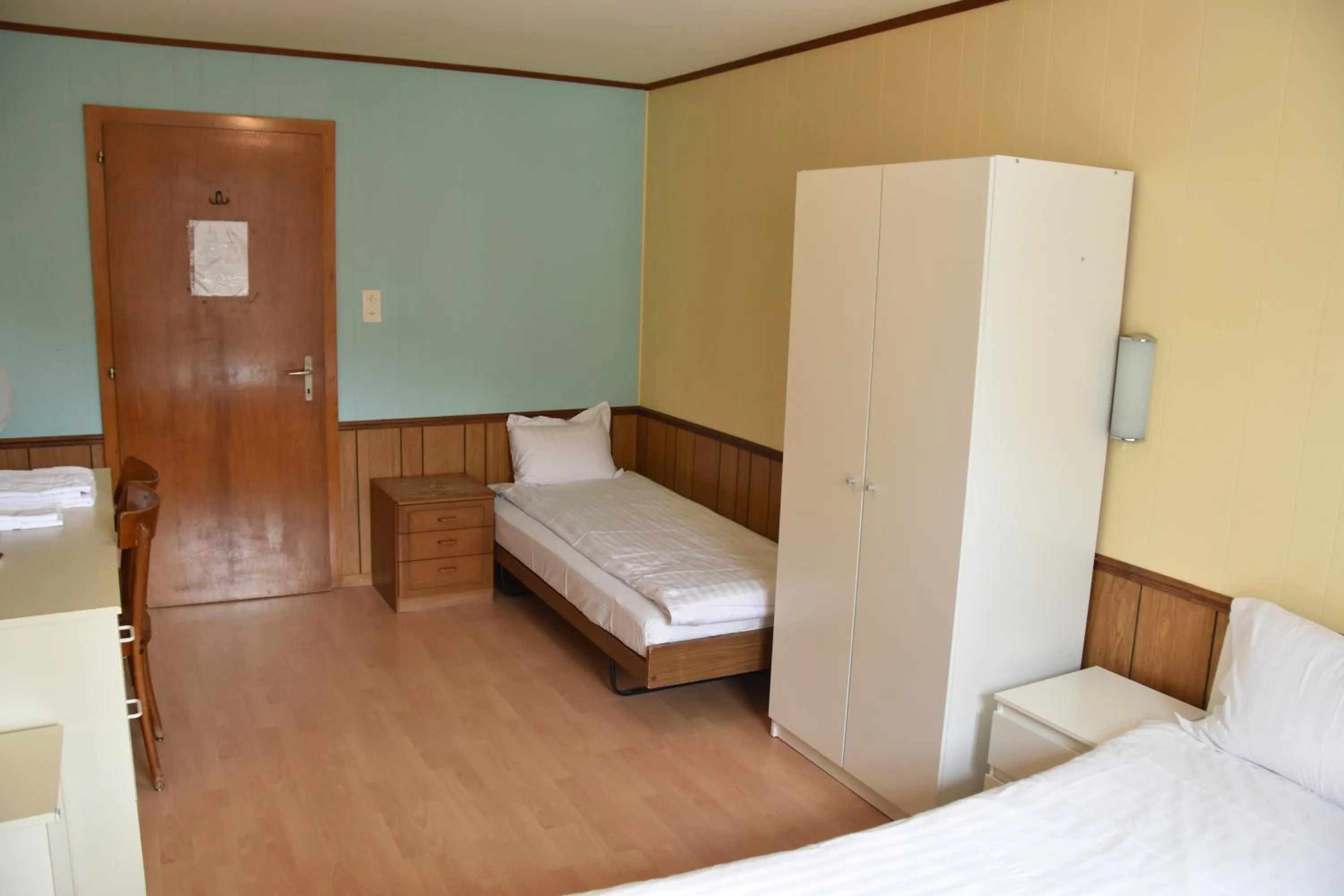 Bed in Hôtel de l'ours