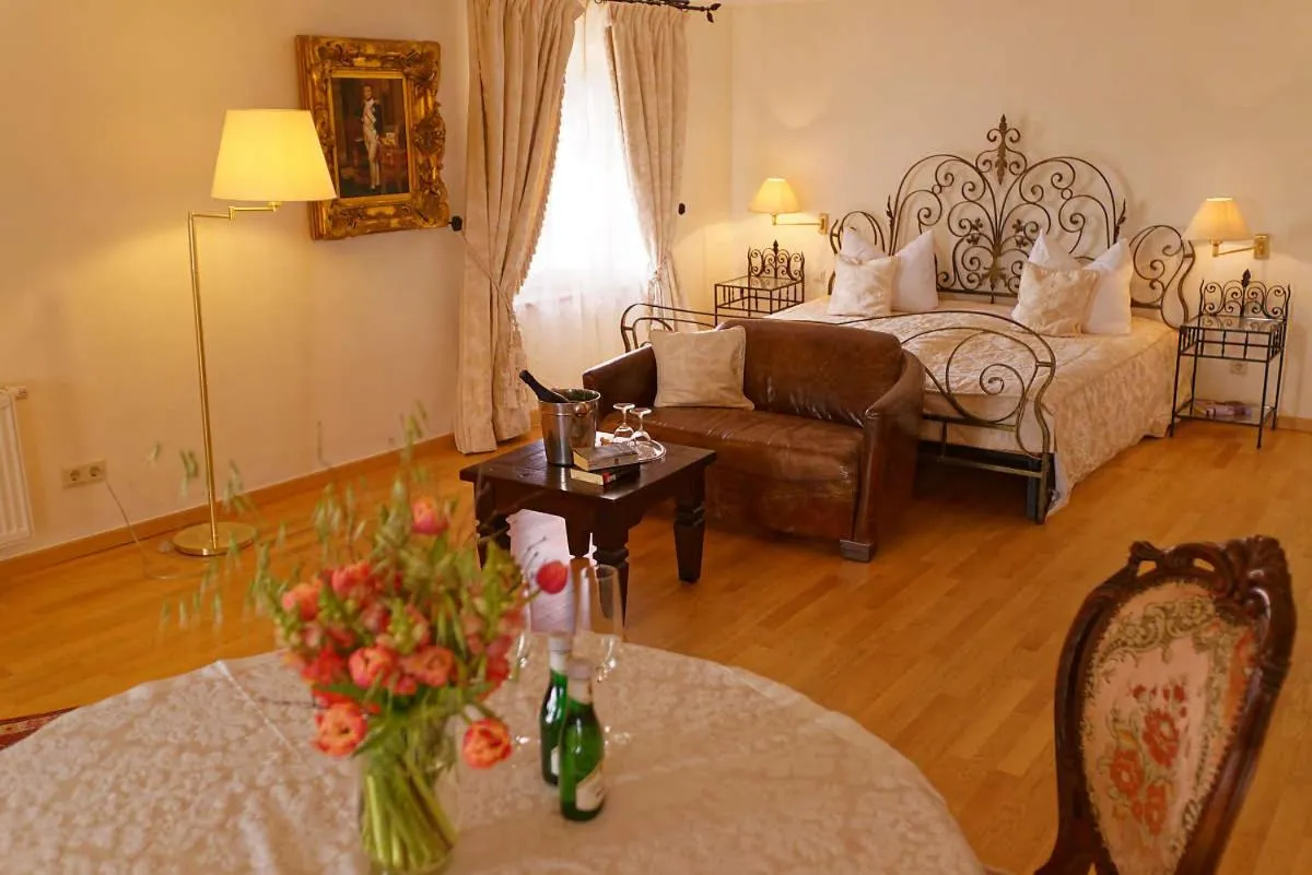 Photo of the whole room, Bed in Burghaus & Villa Kronenburg