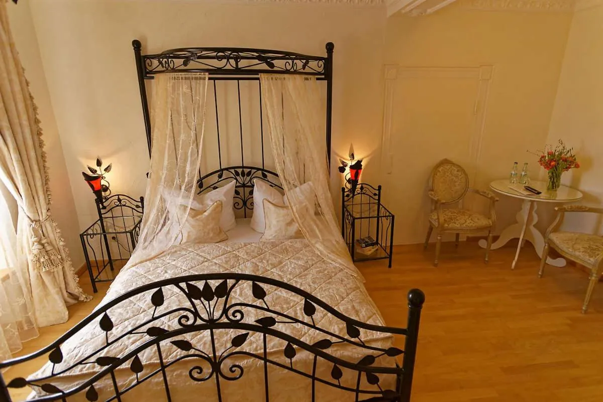 Photo of the whole room, Bed in Burghaus & Villa Kronenburg