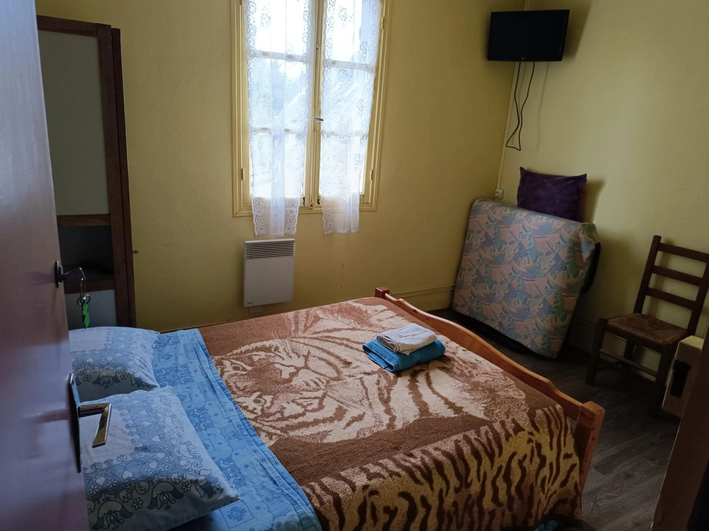 Bed in Auberge Du Bon Coin