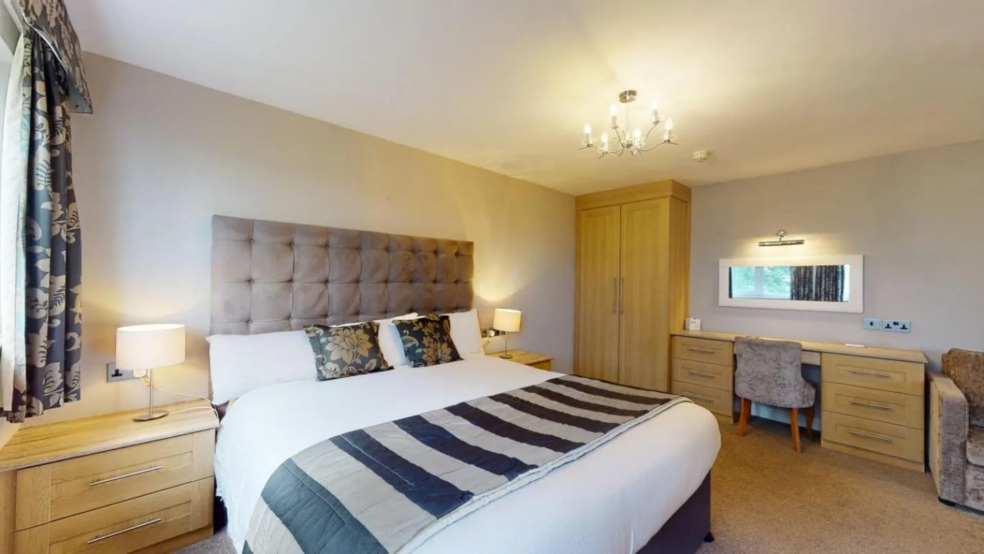 Bed in Stirk House Hotel