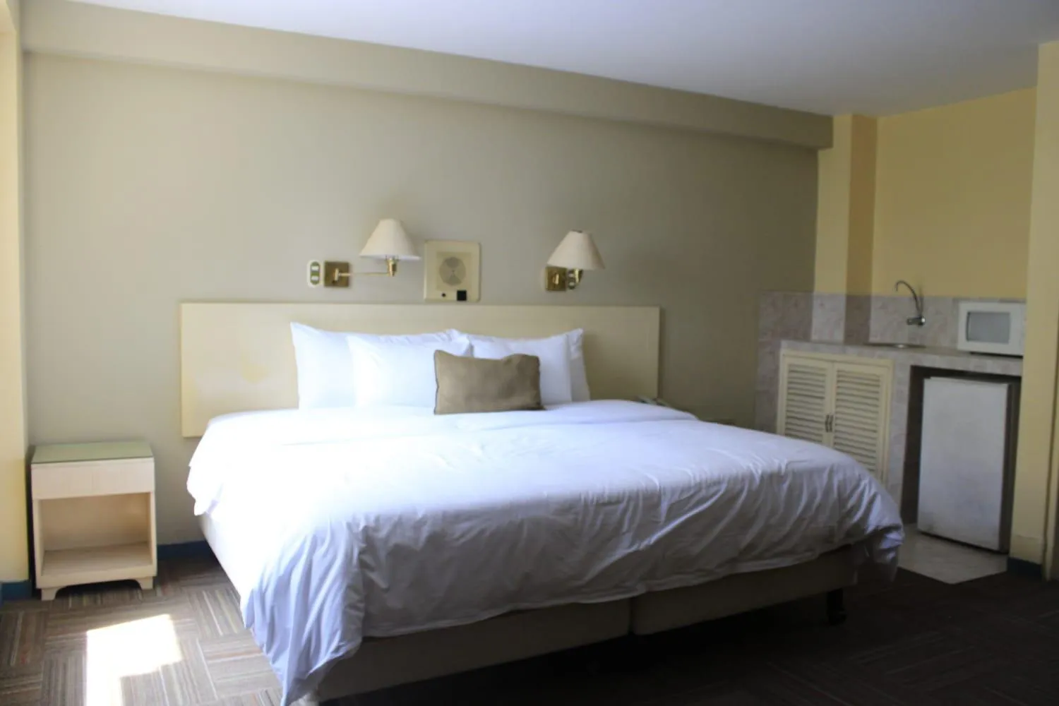 Bed in Embajadores Hotel