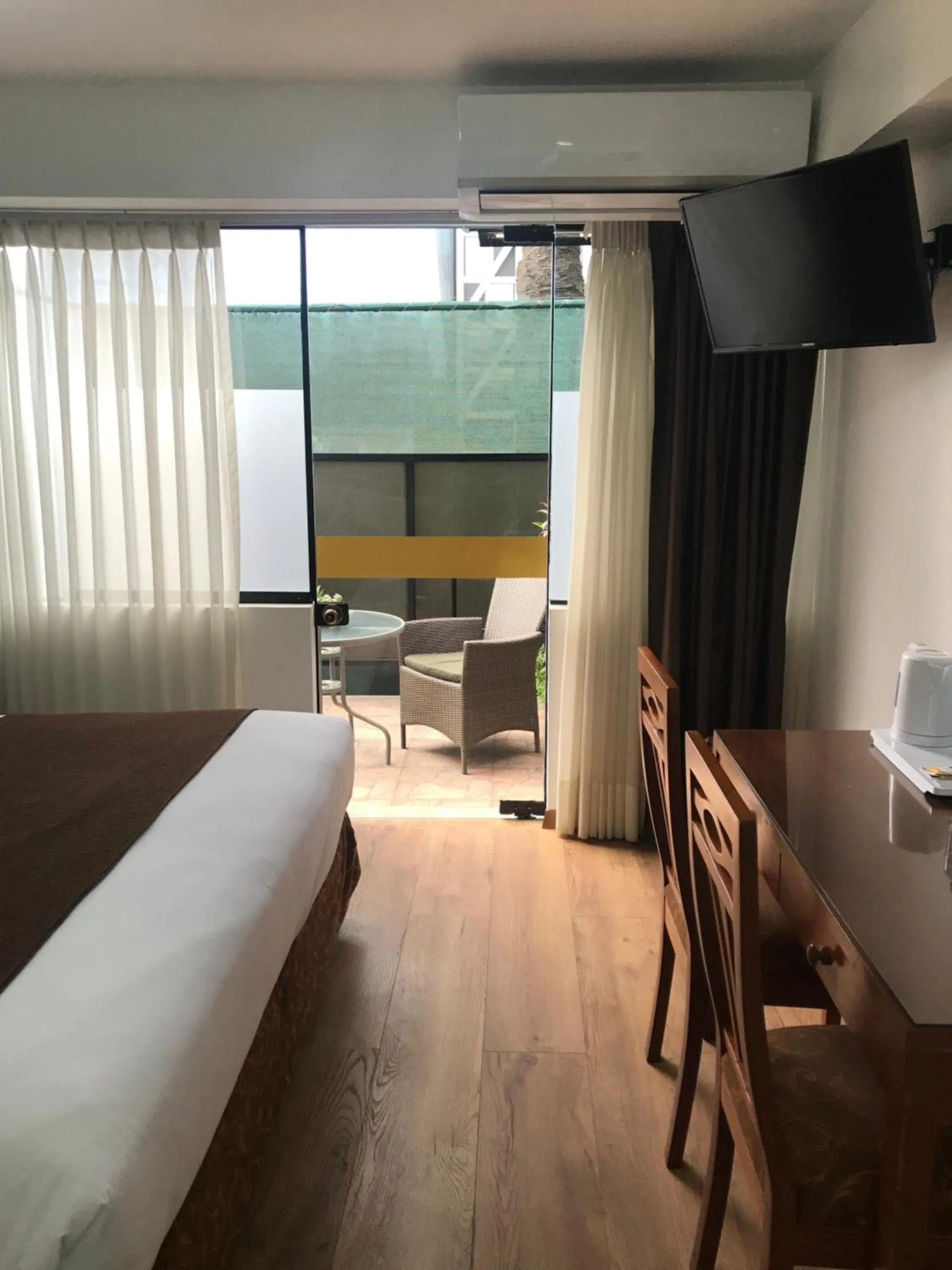 TV and multimedia, Bed in Faraona Grand Hotel