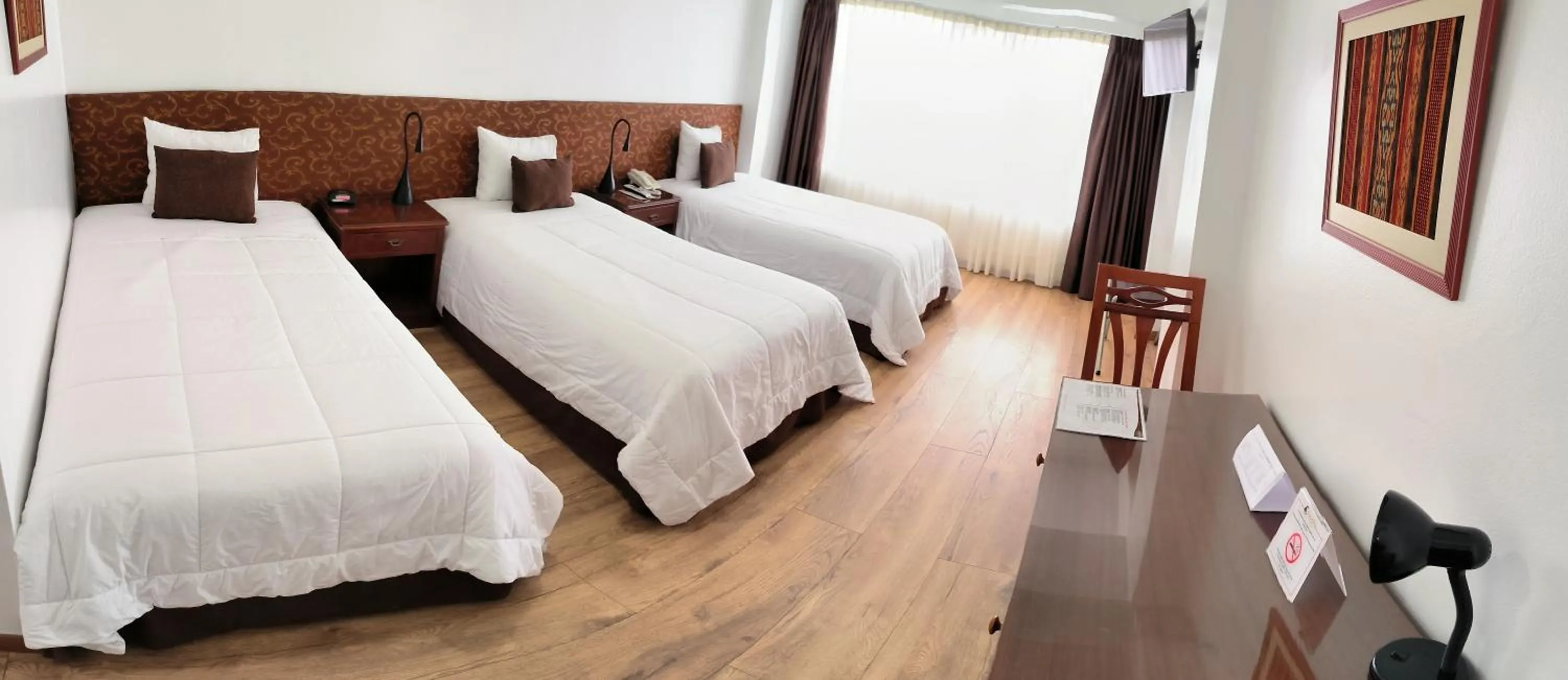 Bed in Faraona Grand Hotel