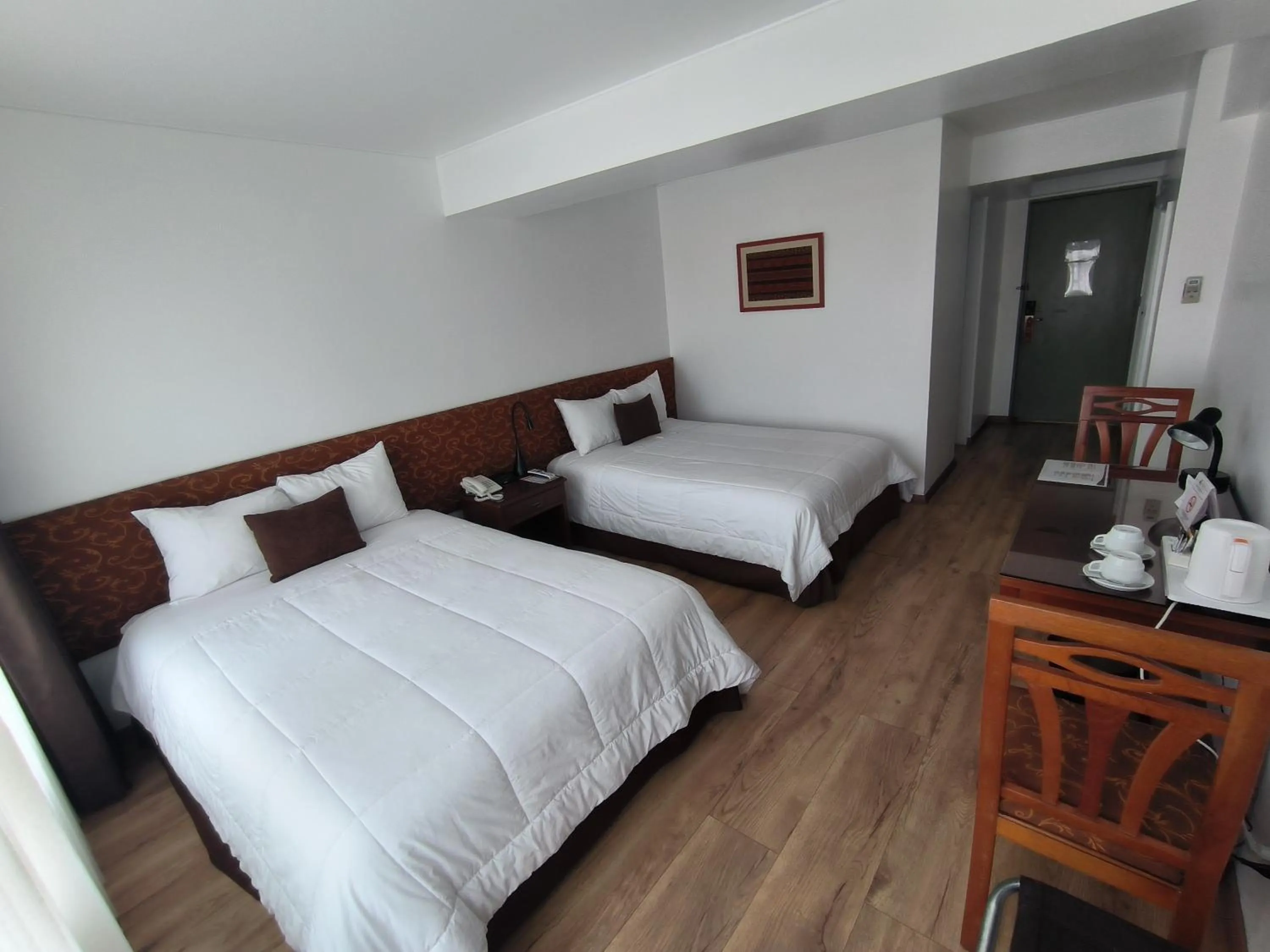 Bed in Faraona Grand Hotel