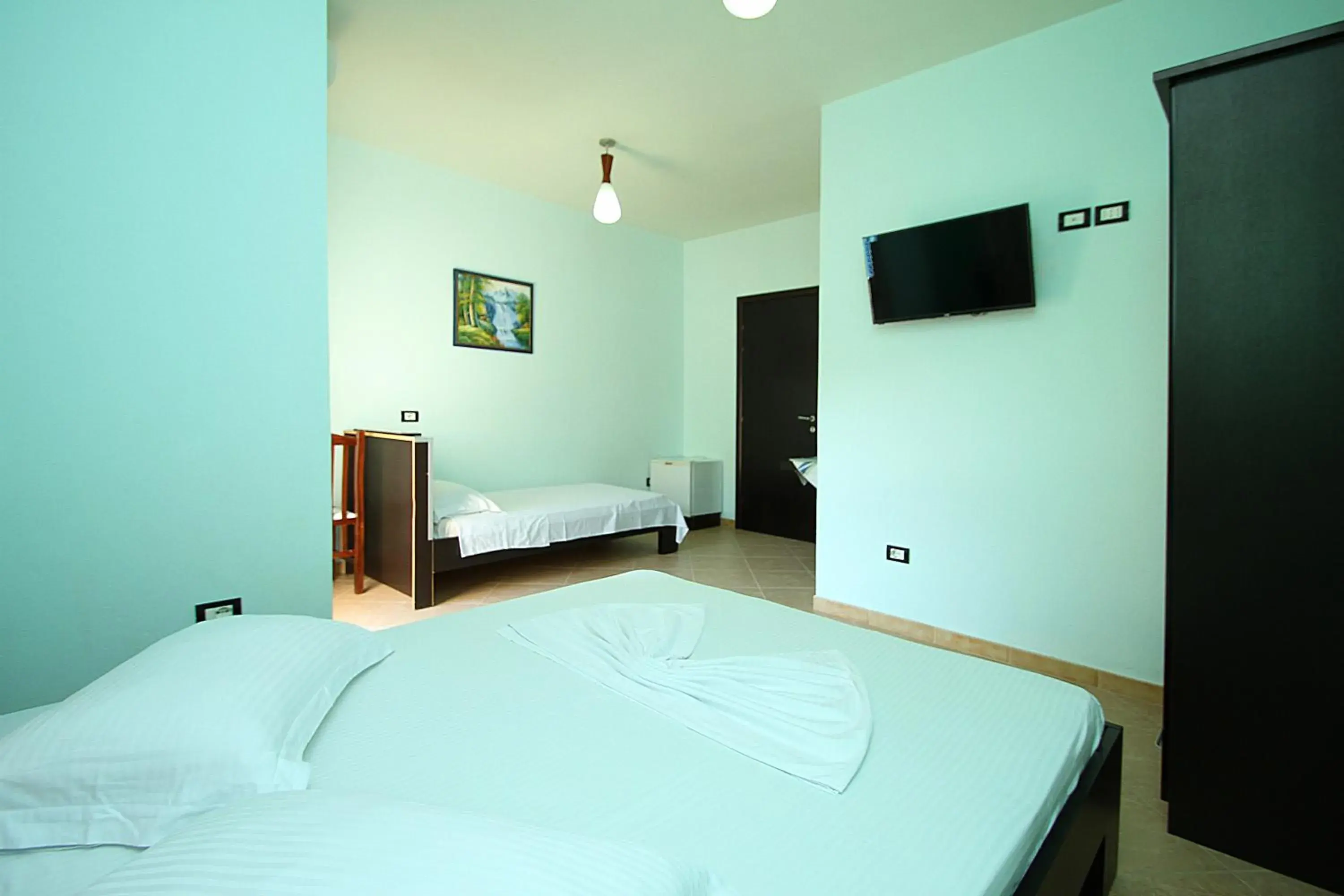 Triple Room with Balcony in AL Hotel Triple Room with Balcony in AL Hotel