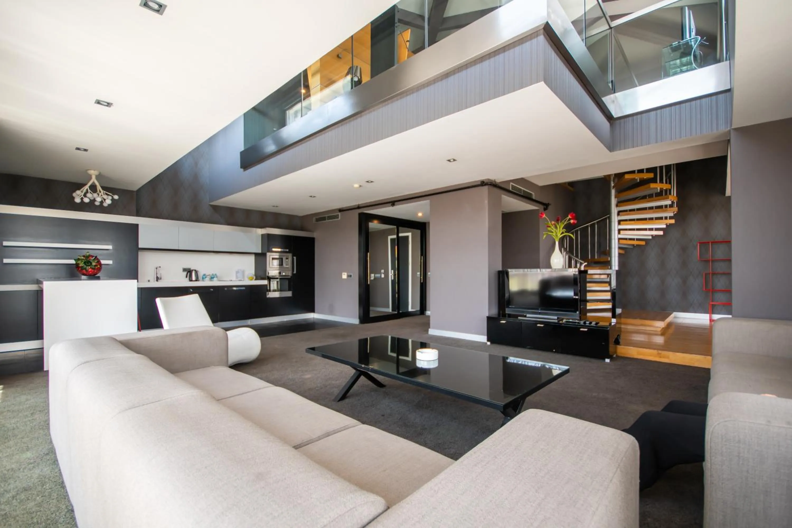 Communal lounge/ TV room in Vernazza Suites