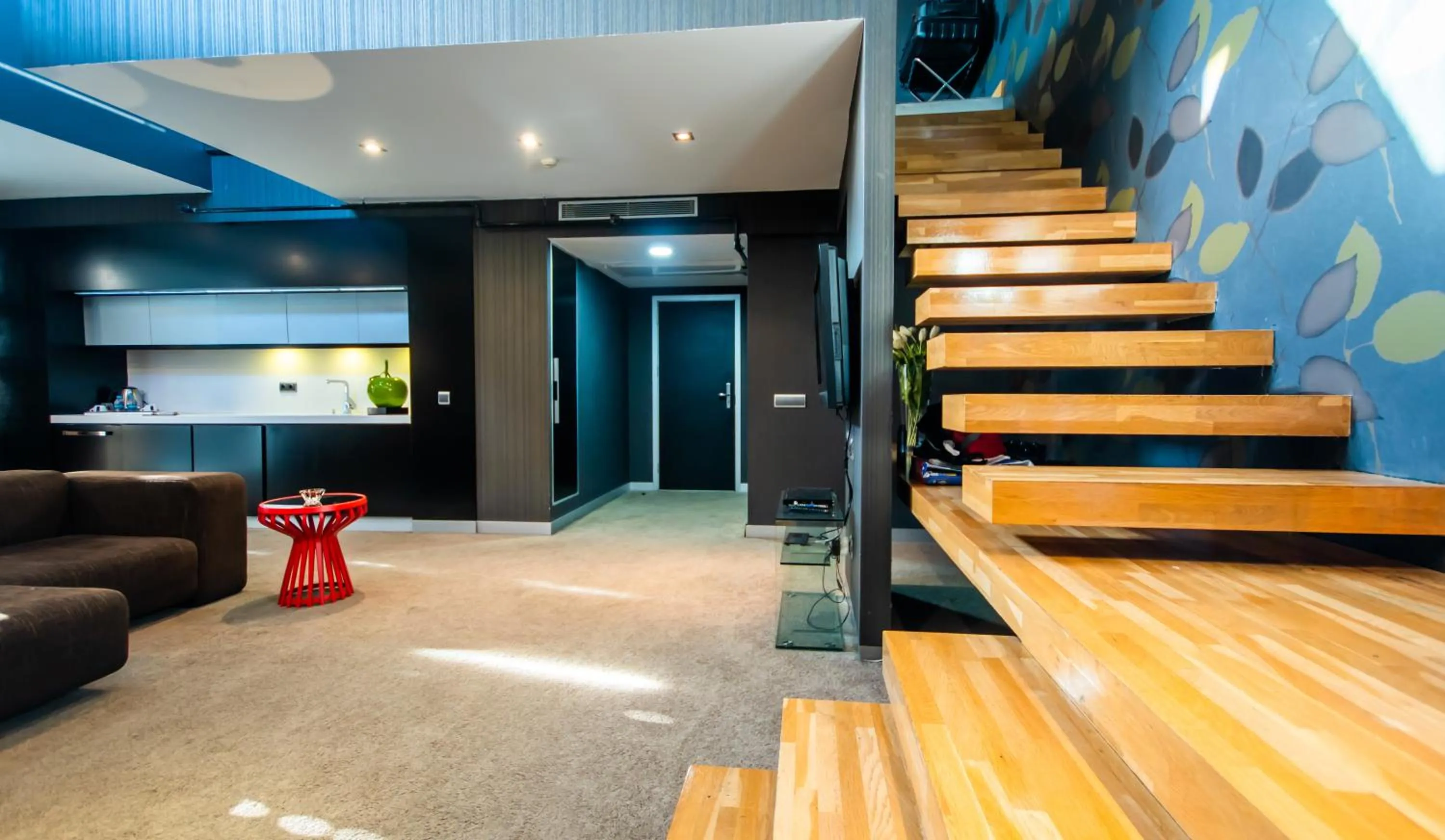 Communal lounge/ TV room in Vernazza Suites