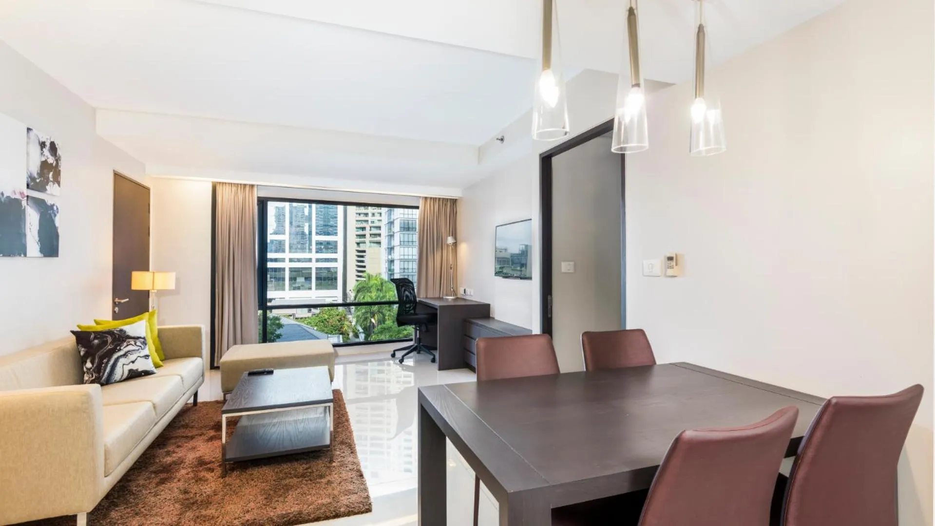 Living room in Maitria Hotel Sukhumvit 18 Bangkok – A Chatrium Collection