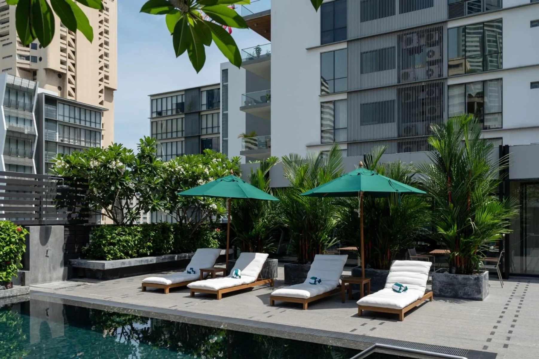 Swimming pool in Maitria Hotel Sukhumvit 18 Bangkok – A Chatrium Collection