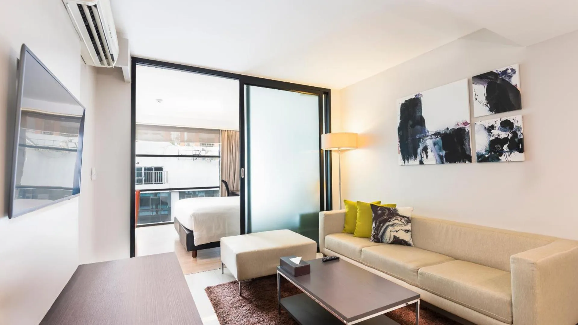 Living room in Maitria Hotel Sukhumvit 18 Bangkok – A Chatrium Collection