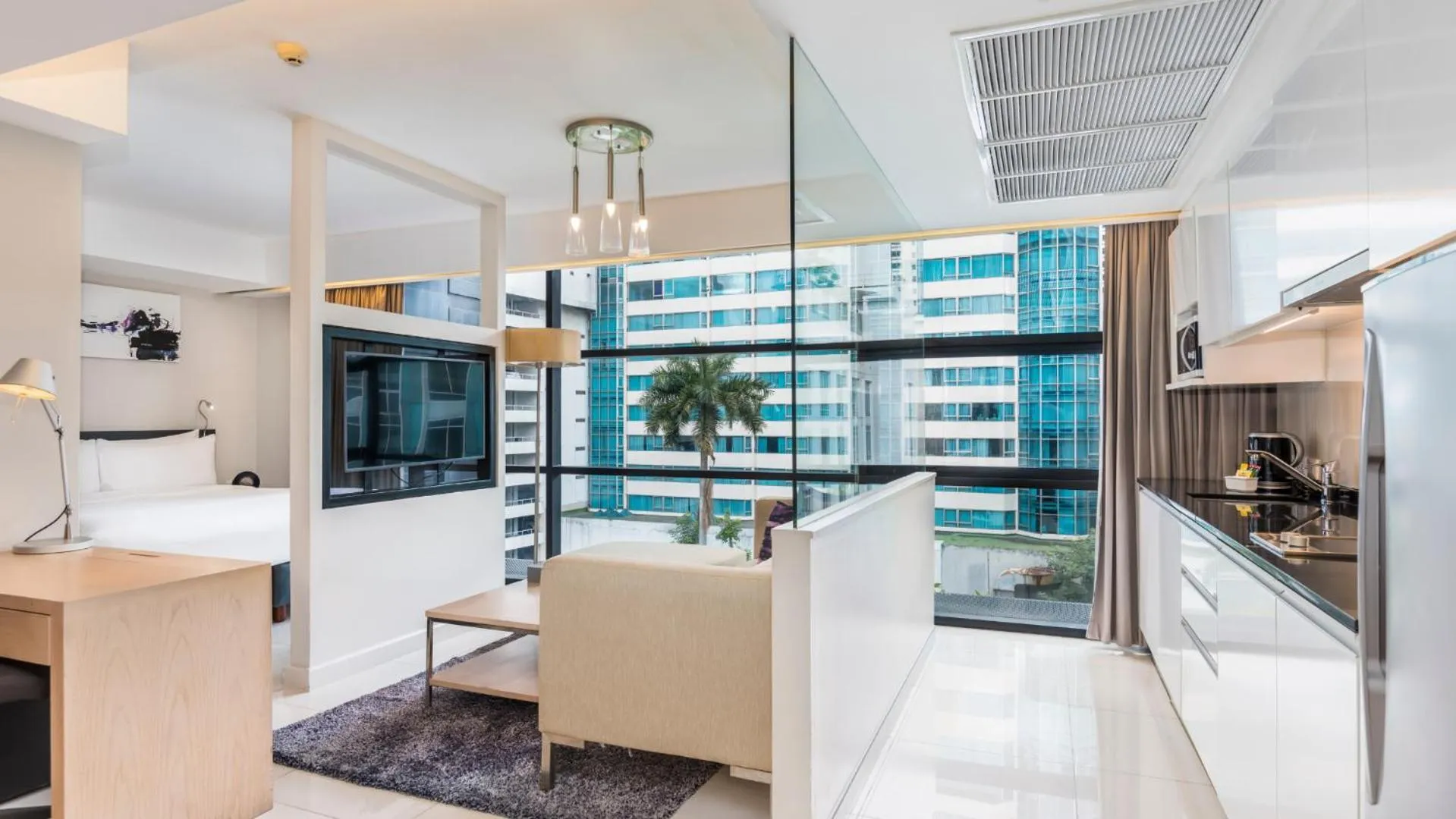 Living room in Maitria Hotel Sukhumvit 18 Bangkok – A Chatrium Collection