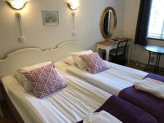 Bed in Hotell Turistgården i Simrishamn
