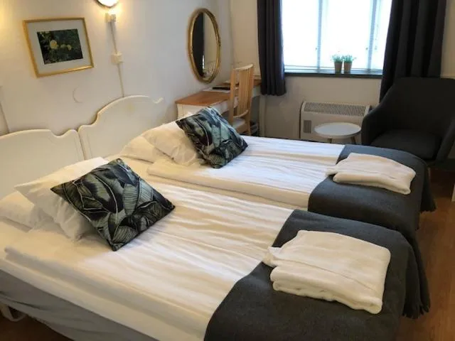 Bed in Hotell Turistgården i Simrishamn