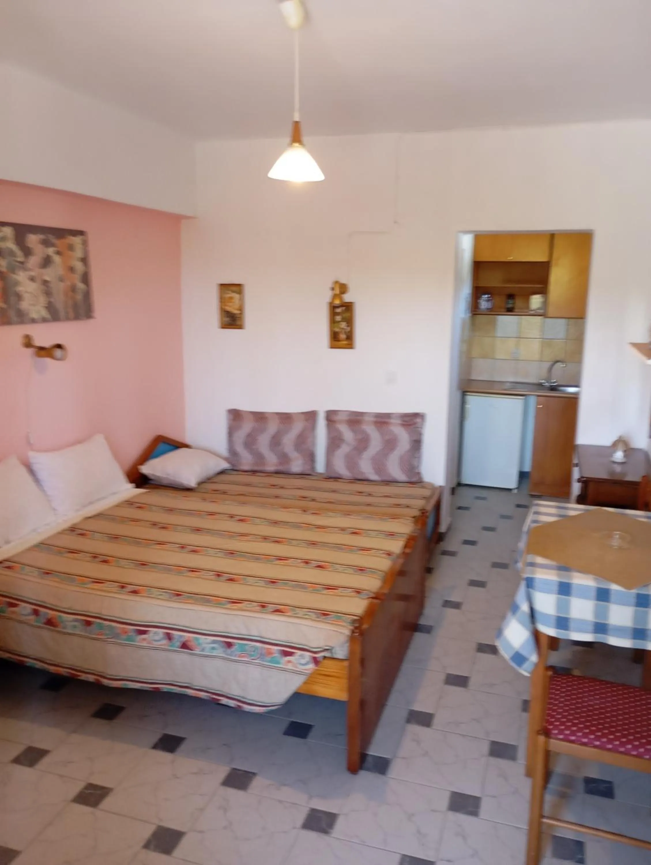 Bed in Denise Apartments Kefalos