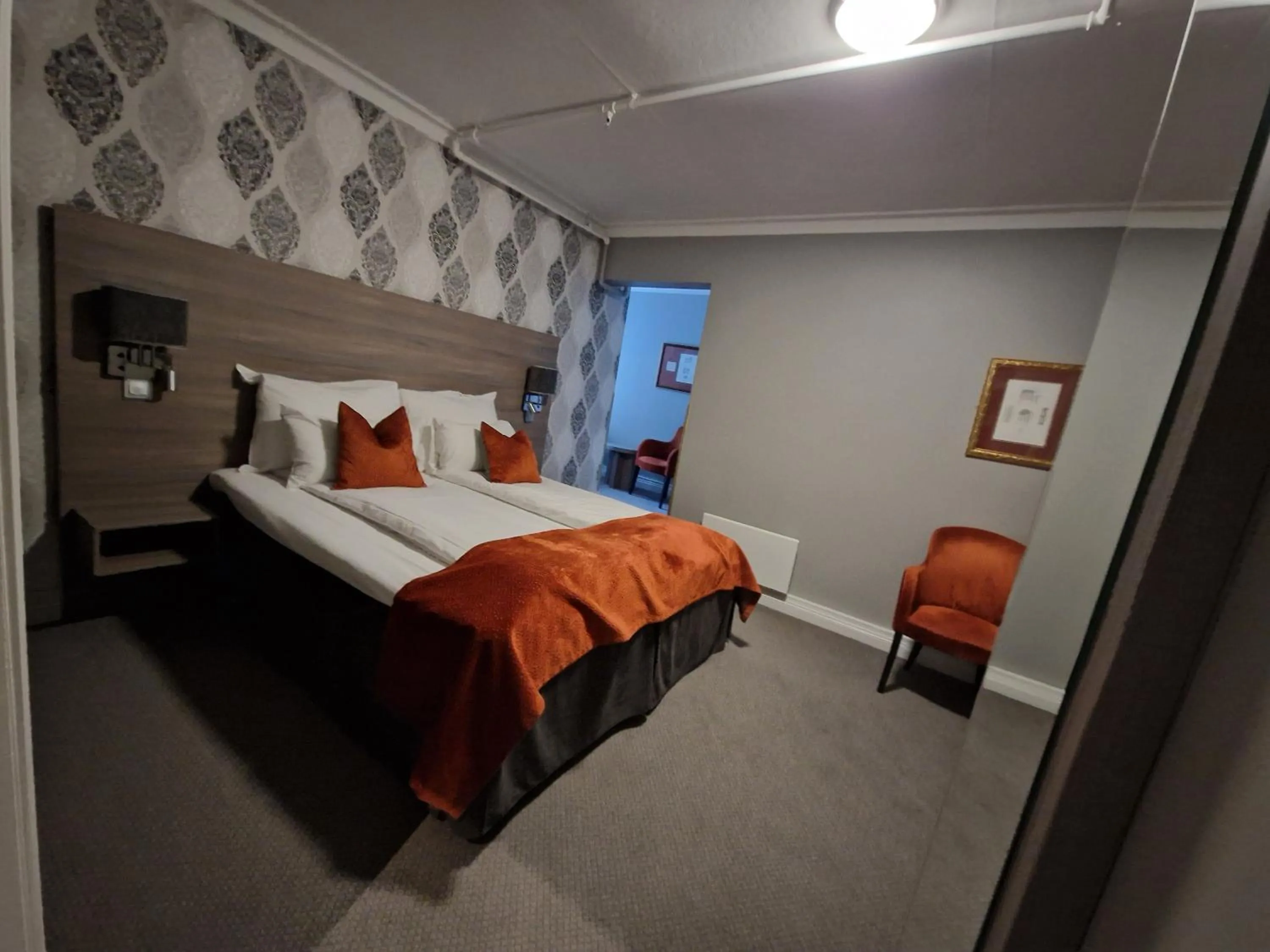 Bed in Dr. Holms Hotel