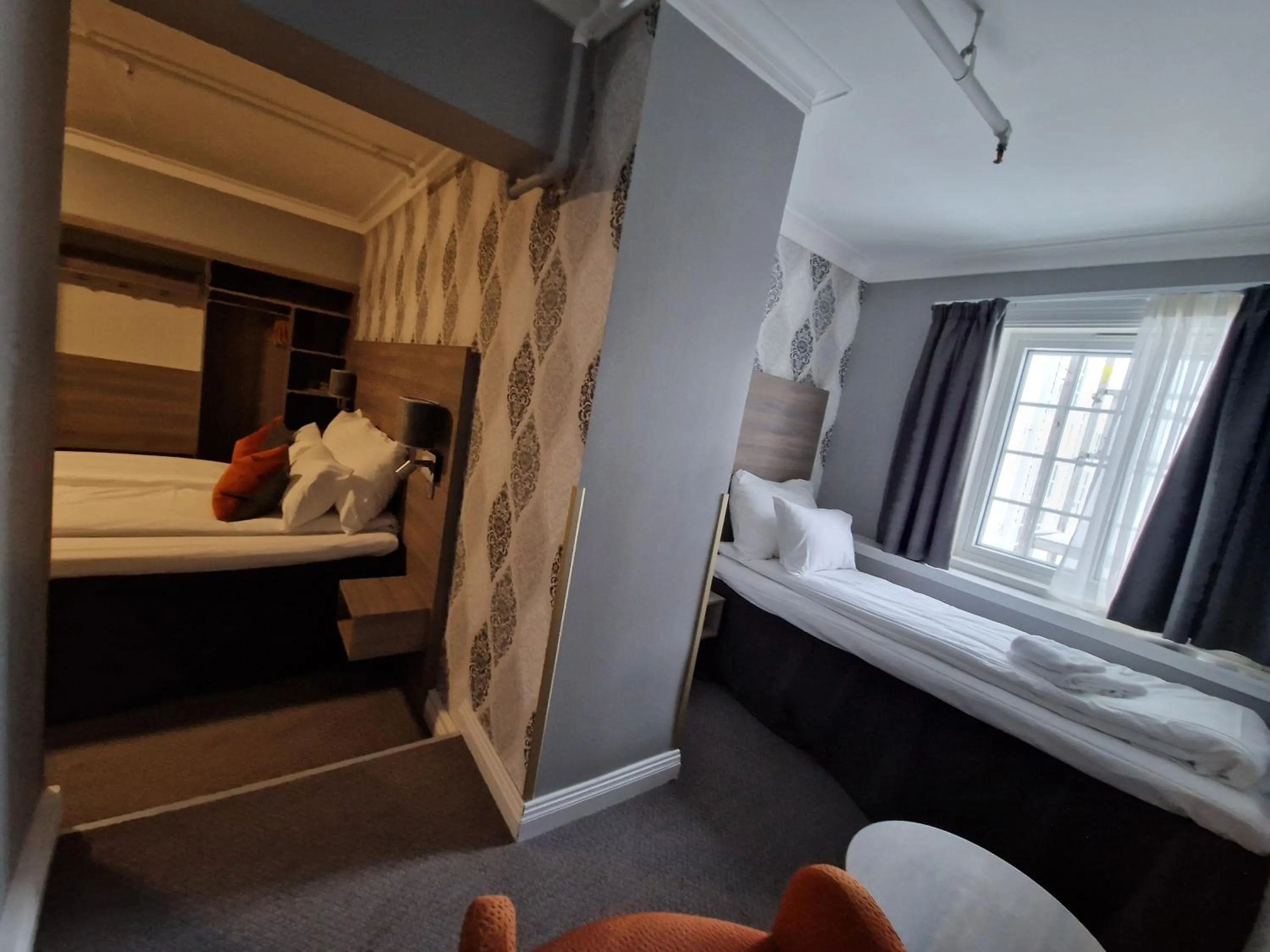 Bed in Dr. Holms Hotel